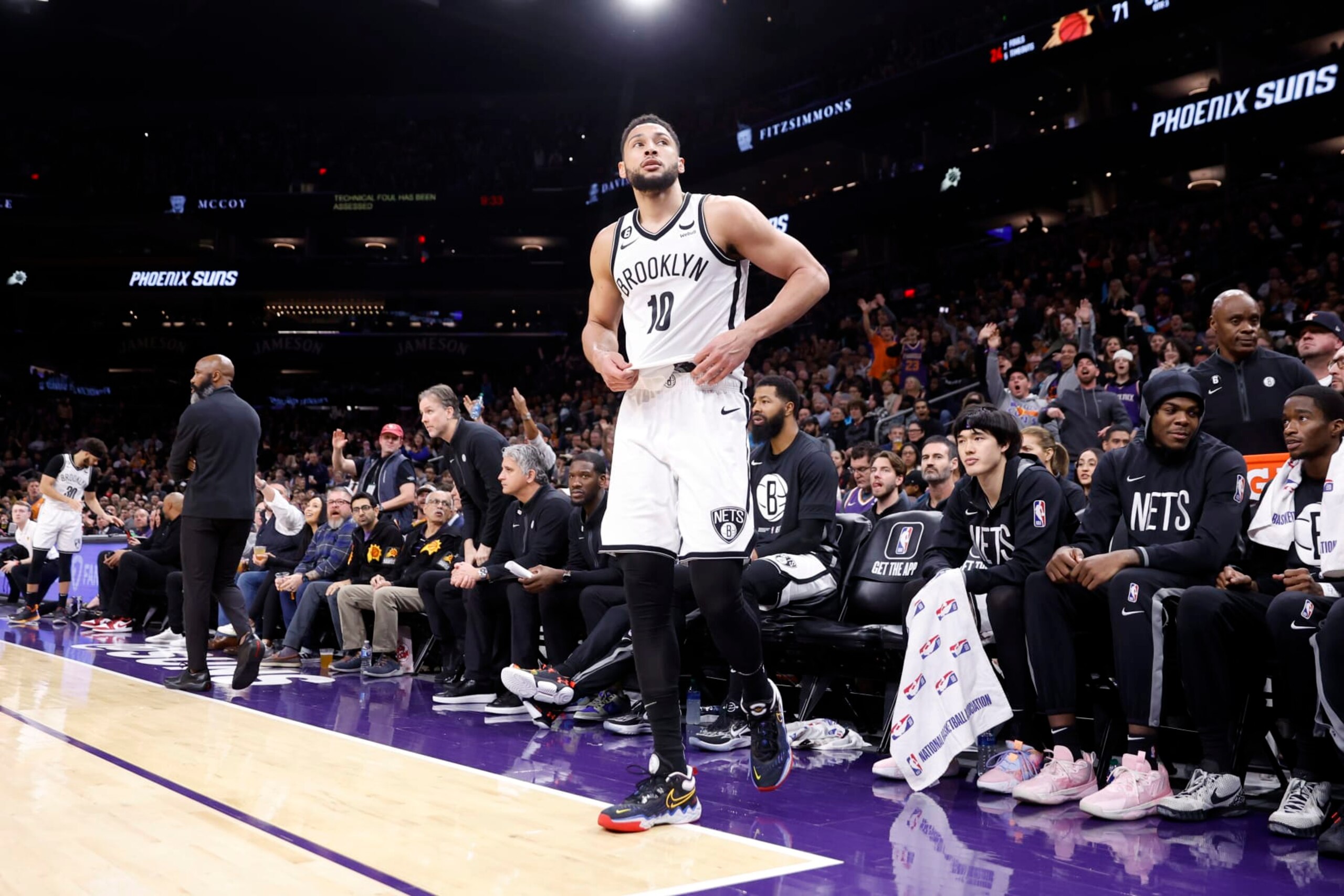 PHOENIX, ARIZONA - JANUARY 19: Ben Simmons #10 of the Brooklyn Nets walks off the bench after being ejected during the second half against the Phoenix Suns at Footprint Center on January 19, 2023 in Phoenix, Arizona. NOTE TO USER: User expressly acknowledges and agrees that,  by downloading and or using this photograph,  User is consenting to the terms and conditions of the Getty Images License Agreement. (Photo by Chris Coduto/Getty Images)