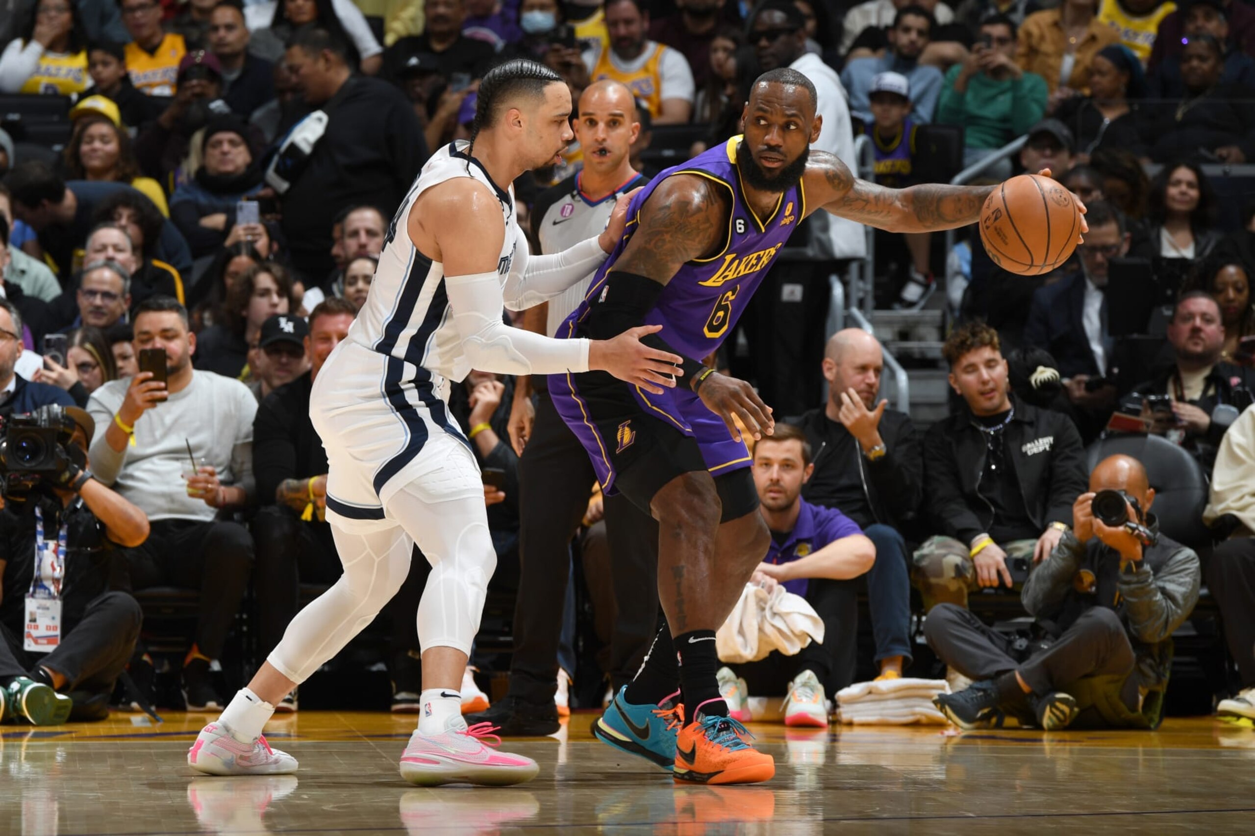 LOS ANGELES, CA - JANUARY 20: LeBron James #6 of the Los Angeles Lakers dribbles the ball during the game against the Memphis Grizzlies on January 20, 2023 at Crypto.Com Arena in Los Angeles, California. NOTE TO USER: User expressly acknowledges and agrees that, by downloading and/or using this Photograph, user is consenting to the terms and conditions of the Getty Images License Agreement. Mandatory Copyright Notice: Copyright 2023 NBAE (Photo by Andrew D. Bernstein/NBAE via Getty Images)