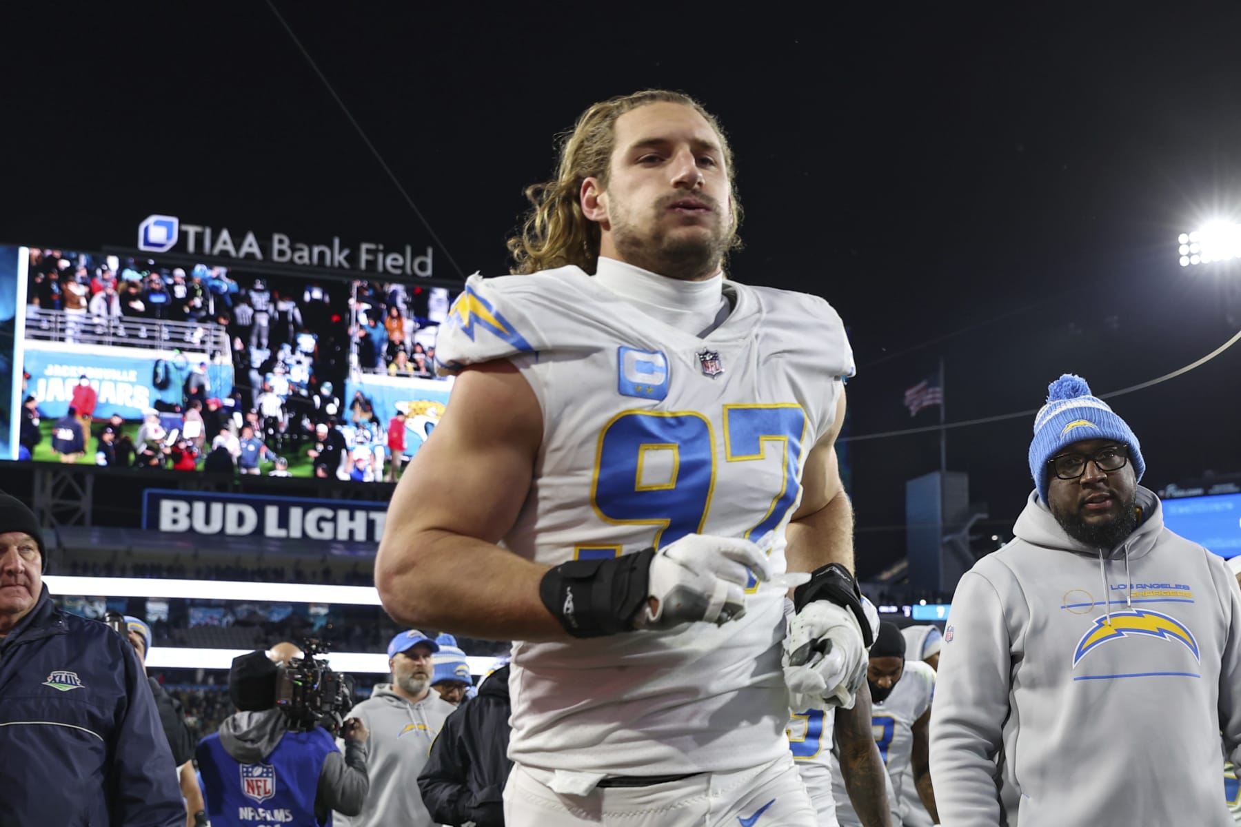 Los Angeles Chargers linebacker Joey Bosa (97) jogs off the field at halftime of an NFL wild-card football game against the Jacksonville Jaguars, Saturday, Jan. 14, 2023, in Jacksonville, Fla. The Jaguars defeated the Chargers 31-30. (AP Photo/Gary McCullough)