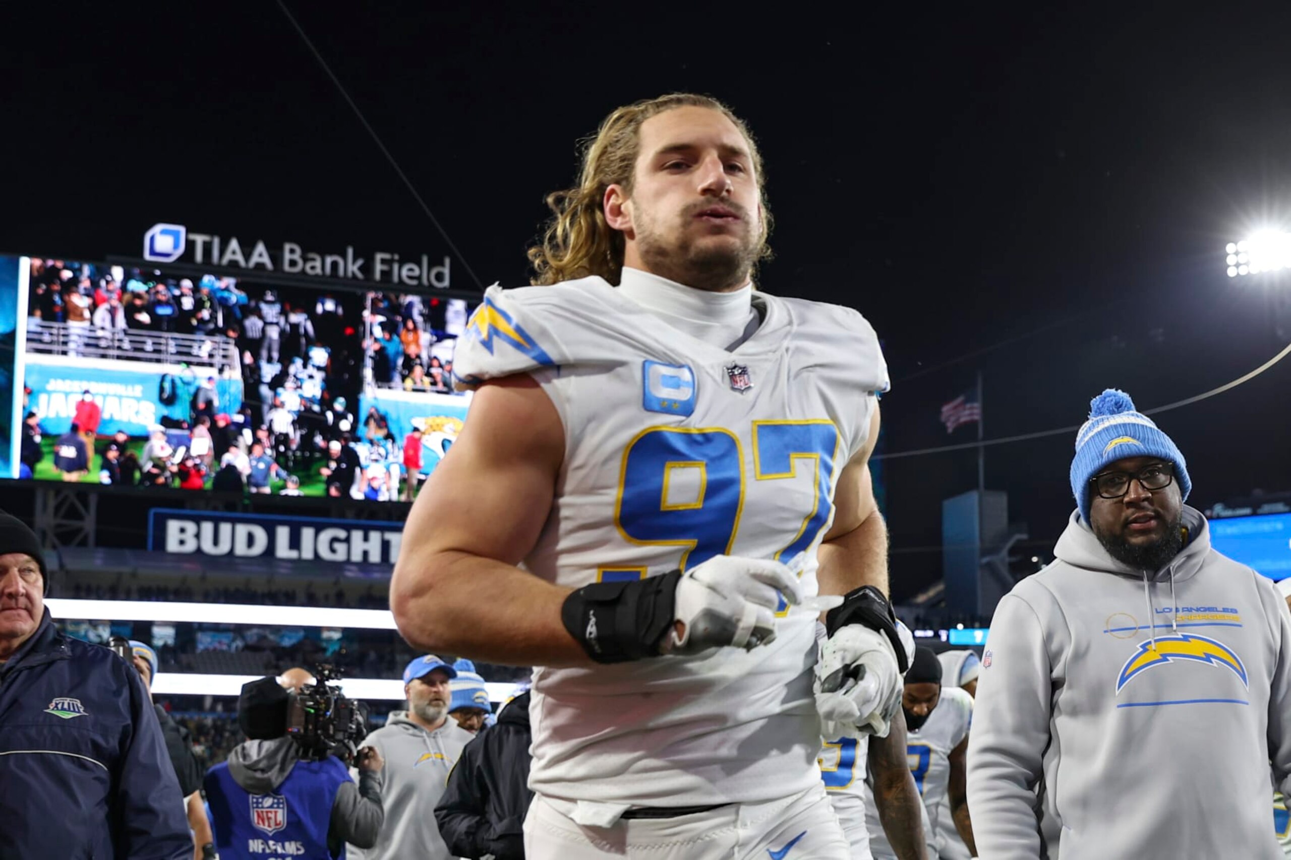 Los Angeles Chargers linebacker Joey Bosa (97) jogs off the field at halftime of an NFL wild-card football game against the Jacksonville Jaguars, Saturday, Jan. 14, 2023, in Jacksonville, Fla. The Jaguars defeated the Chargers 31-30. (AP Photo/Gary McCullough)