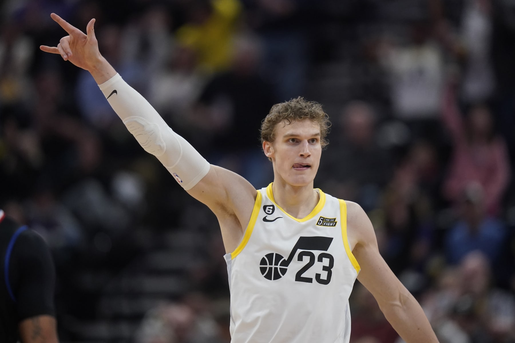 Utah Jazz forward Lauri Markkanen (23) celebrates after making a 3-pointer against the Los Angeles Clippers during the second half of an NBA basketball game Wednesday, Jan. 18, 2023, in Salt Lake City. (AP Photo/Rick Bowmer)
