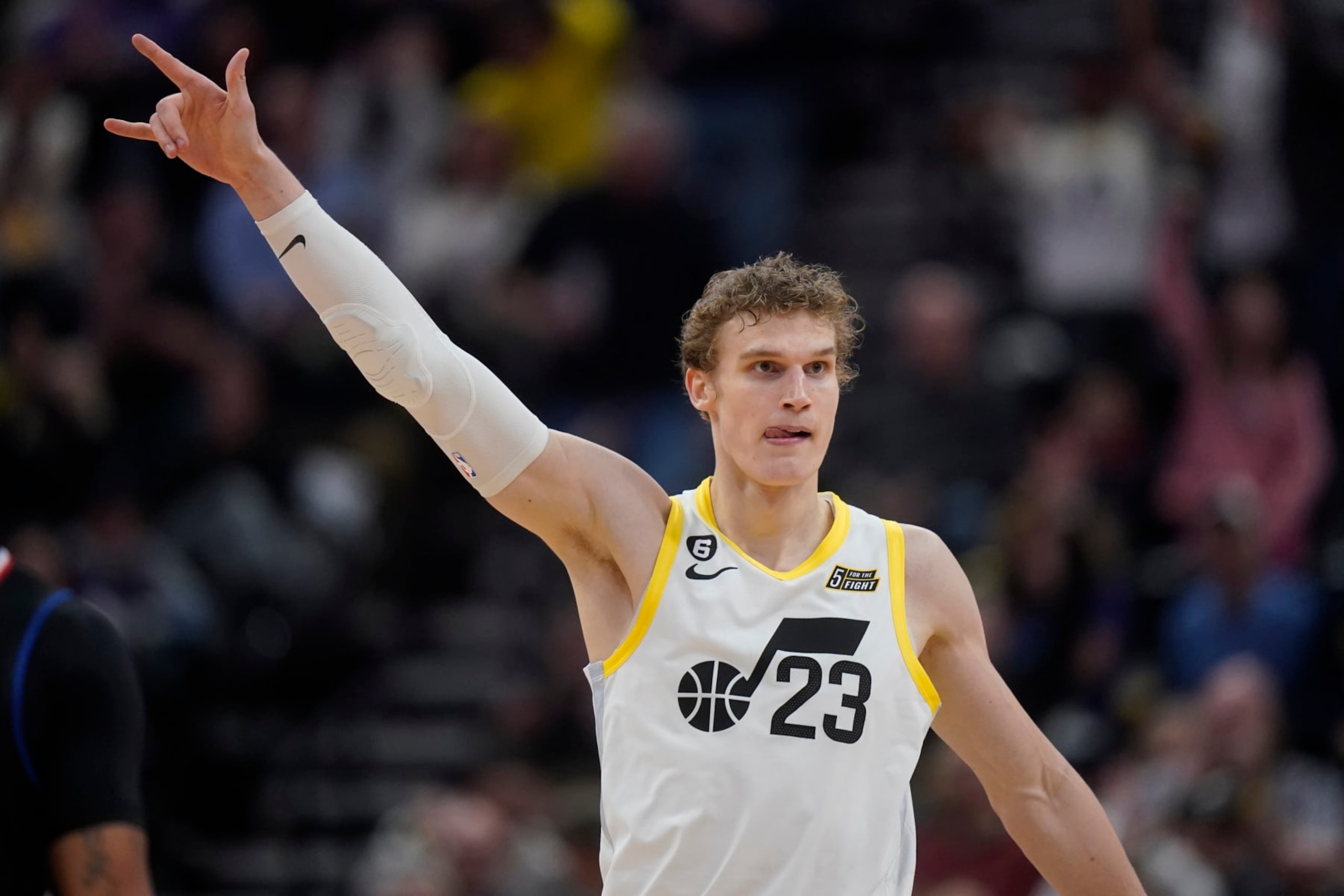 Utah Jazz forward Lauri Markkanen (23) celebrates after making a 3-pointer against the Los Angeles Clippers during the second half of an NBA basketball game Wednesday, Jan. 18, 2023, in Salt Lake City. (AP Photo/Rick Bowmer)