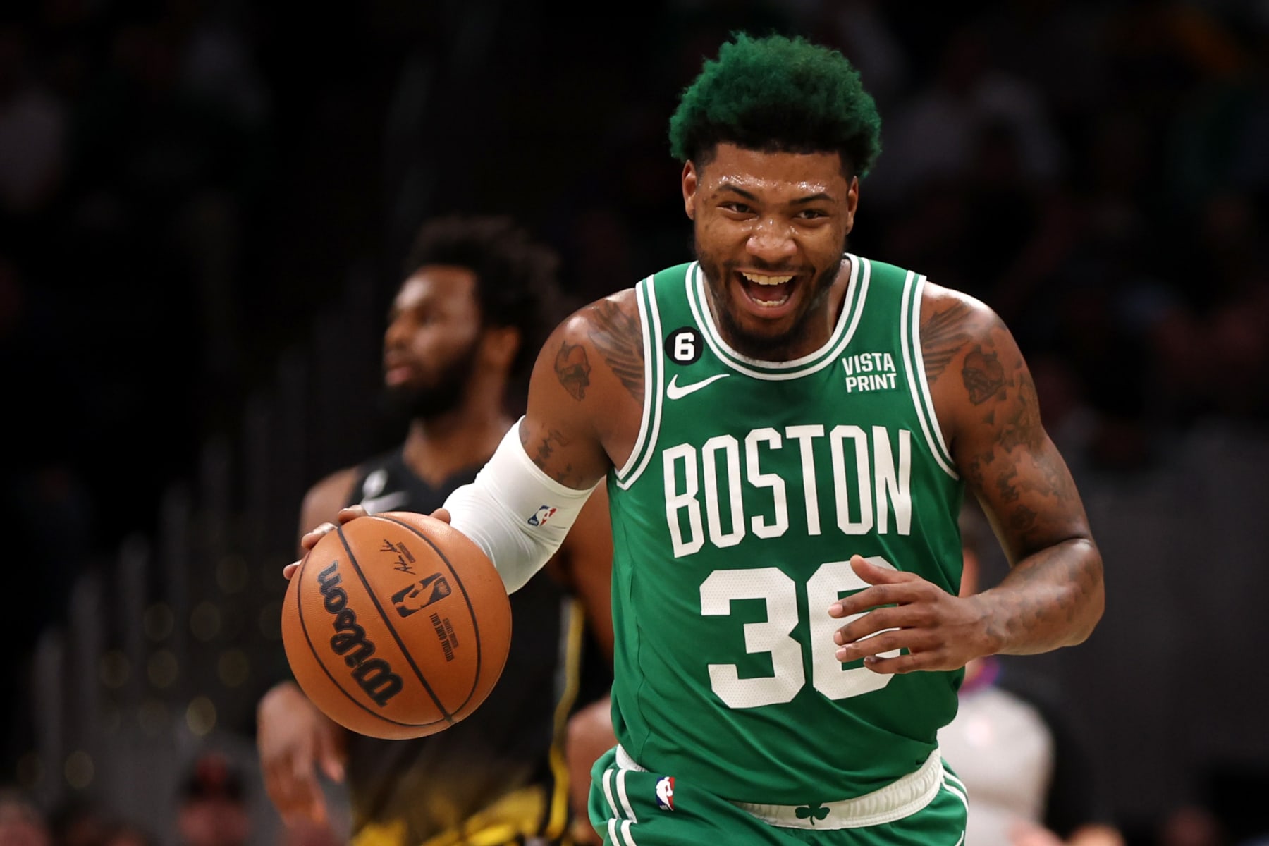 BOSTON, MASSACHUSETTS - JANUARY 19: Marcus Smart #36 of the Boston Celtics reacts during the first half against the Golden State Warriors at TD Garden on January 19, 2023 in Boston, Massachusetts. NOTE TO USER: User expressly acknowledges and agrees that, by downloading and or using this photograph, User is consenting to the terms and conditions of the Getty Images License Agreement. (Photo by Maddie Meyer/Getty Images)