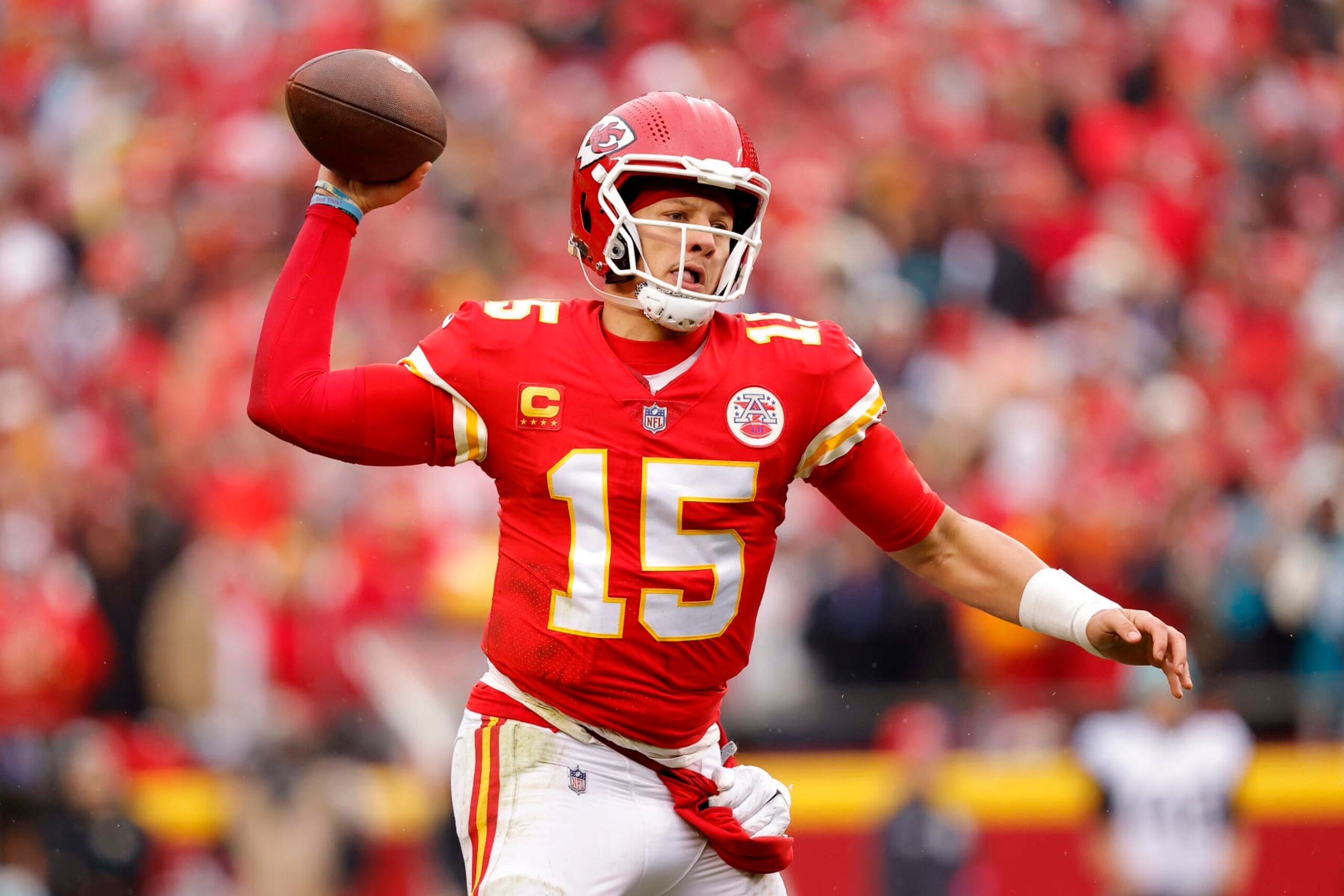 KANSAS CITY, MISSOURI - JANUARY 21: Patrick Mahomes #15 of the Kansas City Chiefs throws a pass against the Jacksonville Jaguars during the first quarter in the AFC Divisional Playoff game at Arrowhead Stadium on January 21, 2023 in Kansas City, Missouri. (Photo by David Eulitt/Getty Images)