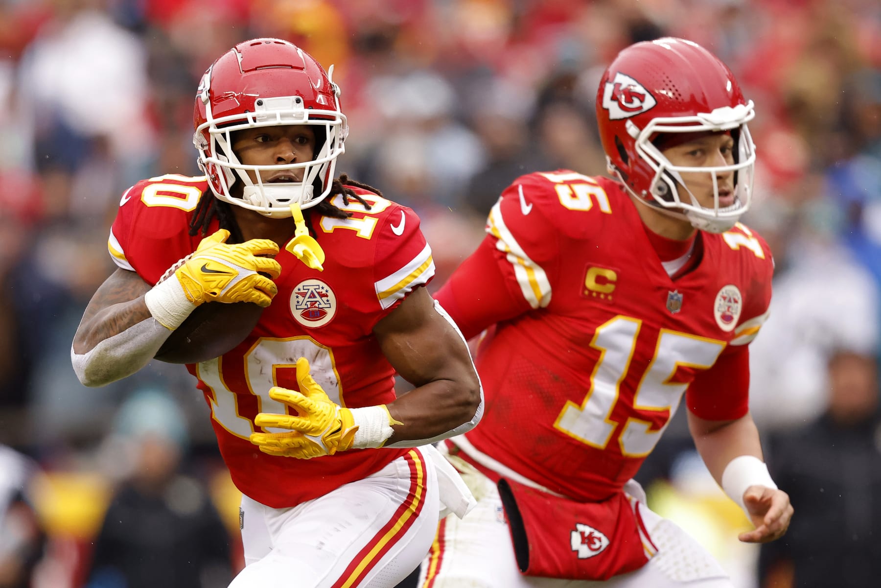 Isiah Pacheco (left) and Patrick Mahomes (right)