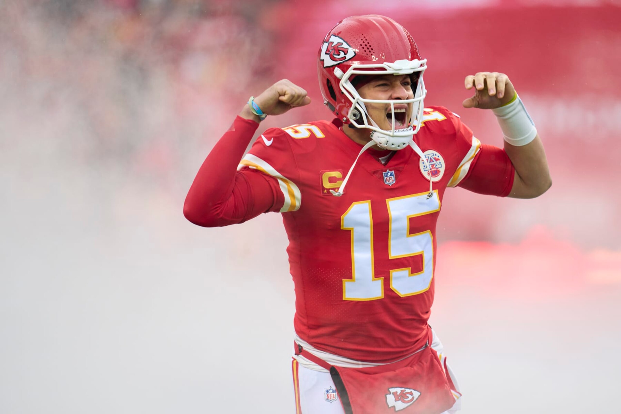 KANSAS CITY, MO - JANUARY 21: Patrick Mahomes #15 of the Kansas City Chiefs celebrates as he is introduced before kickoff against the Jacksonville Jaguars at GEHA Field at Arrowhead Stadium on January 21, 2023 in Kansas City, Missouri. (Photo by Cooper Neill/Getty Images)
