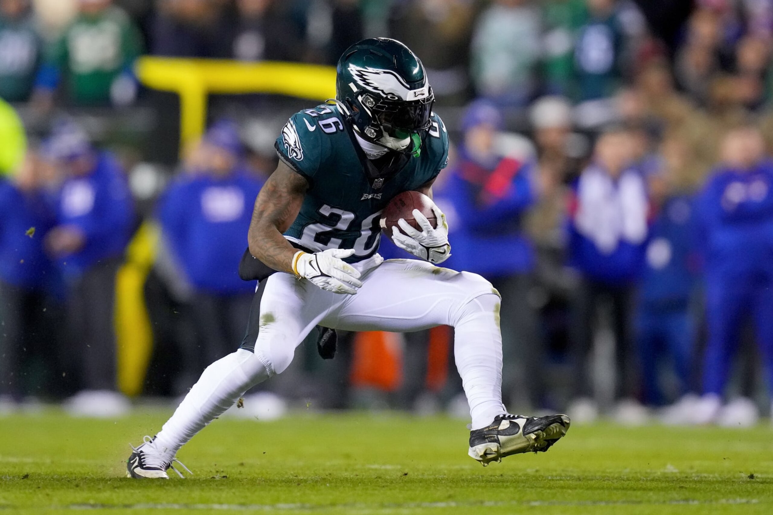 PHILADELPHIA, PENNSYLVANIA - JANUARY 21: Miles Sanders #26 of the Philadelphia Eagles carries the ball against the New York Giants during the second quarter in the NFC Divisional Playoff game at Lincoln Financial Field on January 21, 2023 in Philadelphia, Pennsylvania. (Photo by Mitchell Leff/Getty Images)