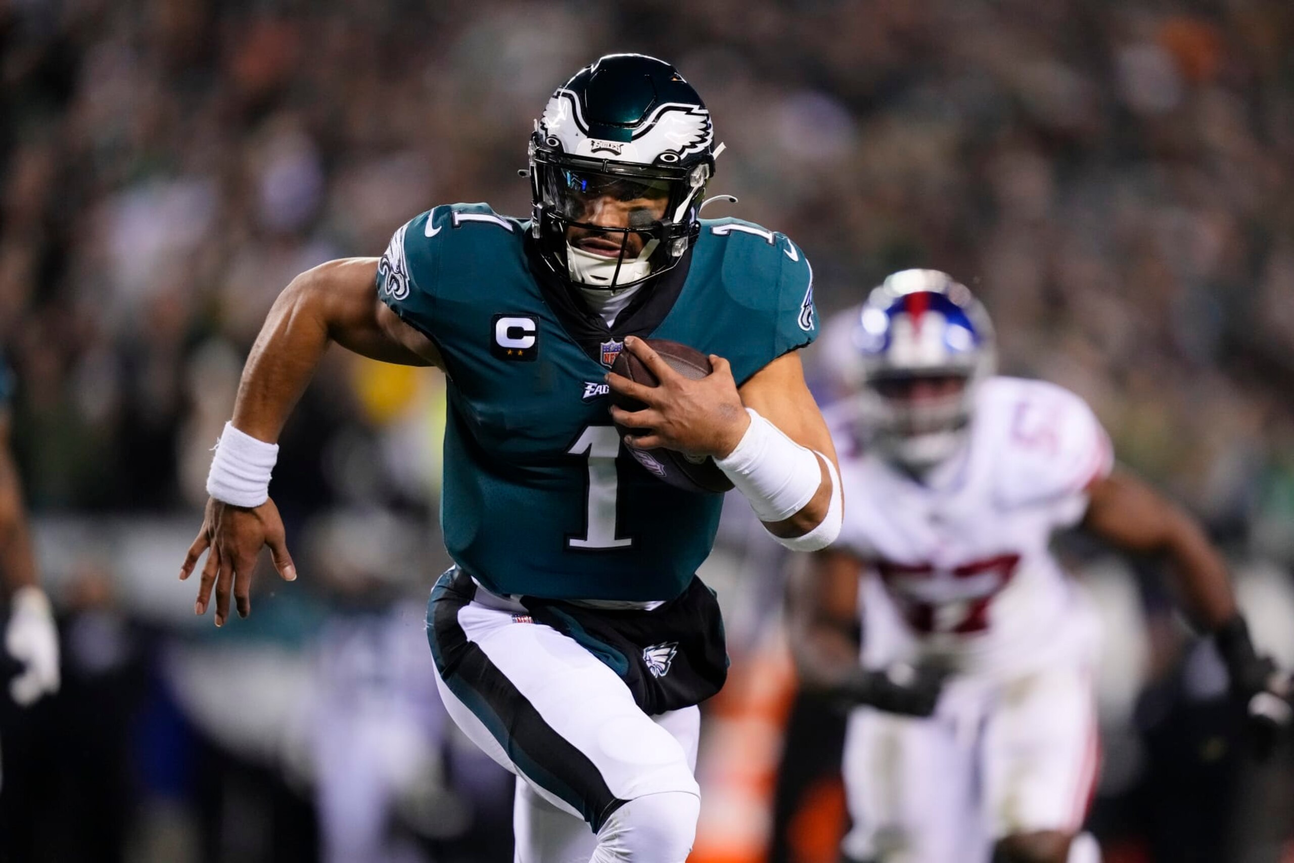 Philadelphia Eagles quarterback Jalen Hurts runs for a touchdown against the New York Giants during the first half of an NFL divisional round playoff football game, Saturday, Jan. 21, 2023, in Philadelphia. (AP Photo/Matt Rourke) Philadelphia Eagles quarterback Jalen Hurts runs for a touchdown against the New York Giants during the first half of an NFL divisional round playoff football game, Saturday, Jan. 21, 2023, in Philadelphia. (AP Photo/Matt Rourke)