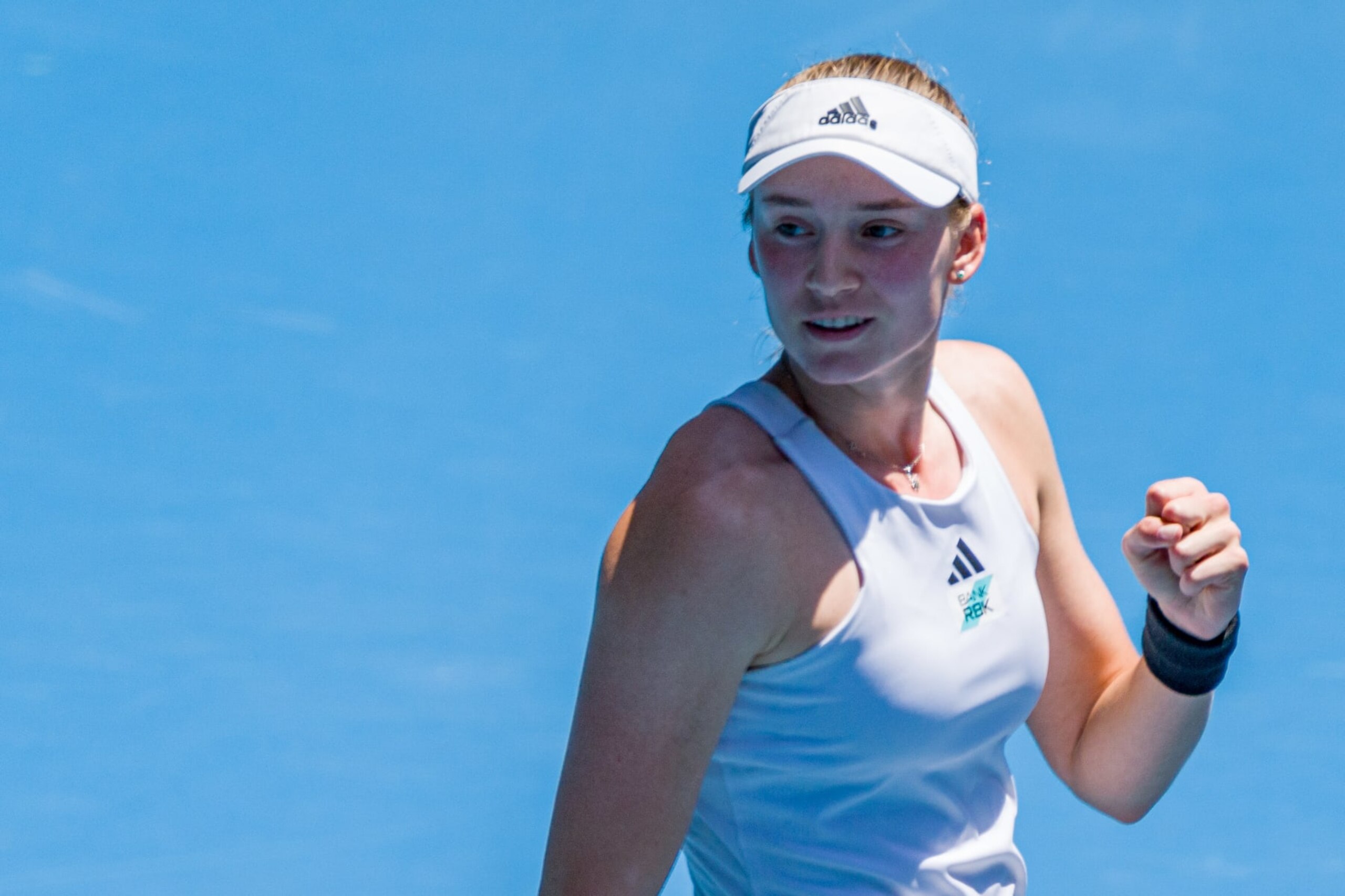 MELBOURNE, AUSTRALIA - JANUARY 22: Elena Rybakina of Kazakhstan celebrates match point during the fourth round singles match against Iga Swiatek of Poland during day seven of the 2023 Australian Open at Melbourne Park on January 22, 2023 in Melbourne, Australia. (Photo by Andy Cheung/Getty Images)