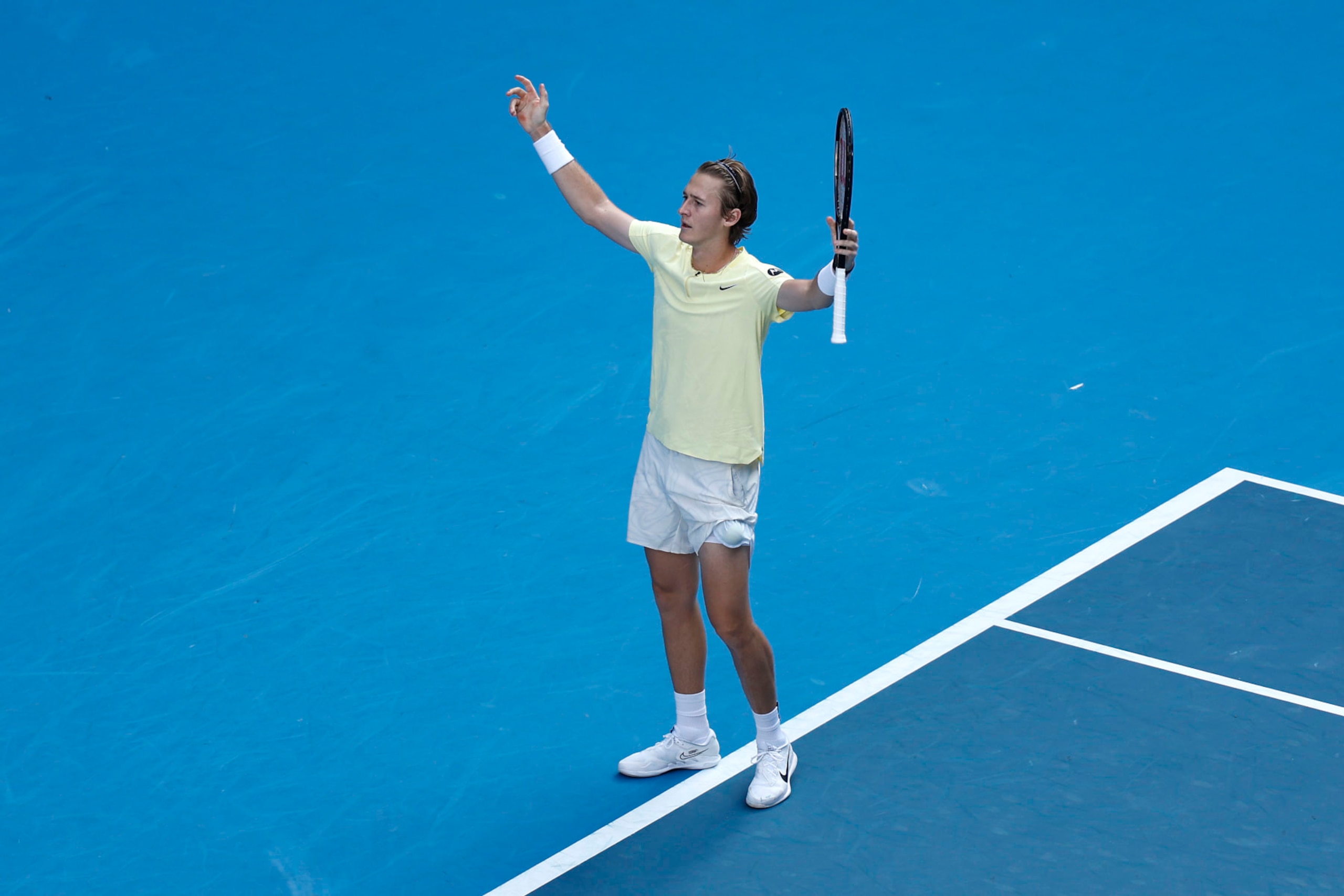 MELBOURNE, AUSTRALIA - JANUARY 22: Sebastian Korda of the United States celebrates match point during the fourth round singles match against Hubert Hurkacz of Poland during day seven of the 2023 Australian Open at Melbourne Park on January 22, 2023 in Melbourne, Australia. (Photo by Darrian Traynor/Getty Images)