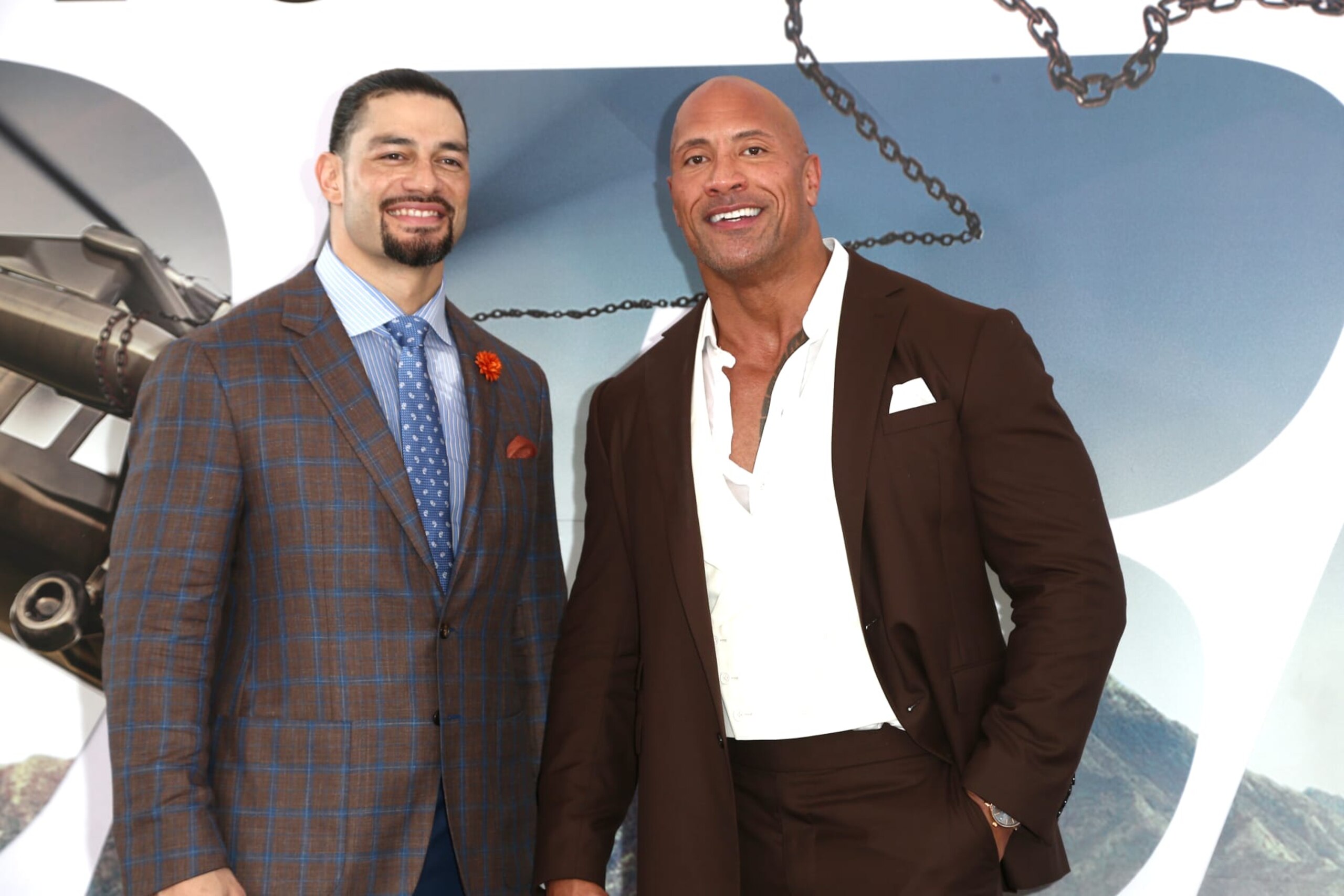 HOLLYWOOD, CALIFORNIA - JULY 13: Roman Reigns and Dwayne Johnson attend the Premiere Of Universal Pictures' "Fast & Furious Presents: Hobbs & Shaw" at Dolby Theatre on July 13, 2019 in Hollywood, California. (Photo by Tommaso Boddi/WireImage)