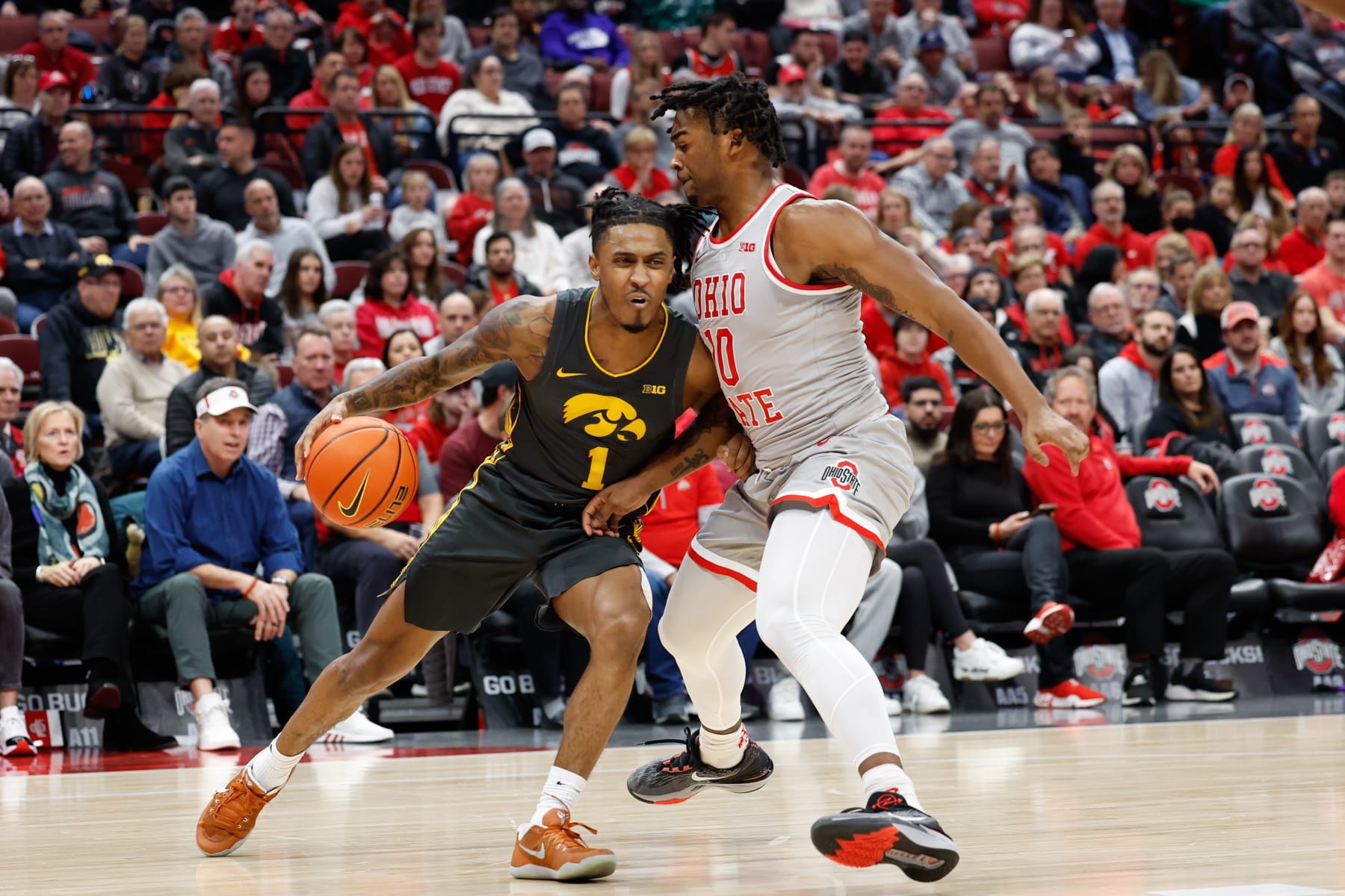 Ohio State's Brice Sensabaugh and Iowa's Ahron Ulis