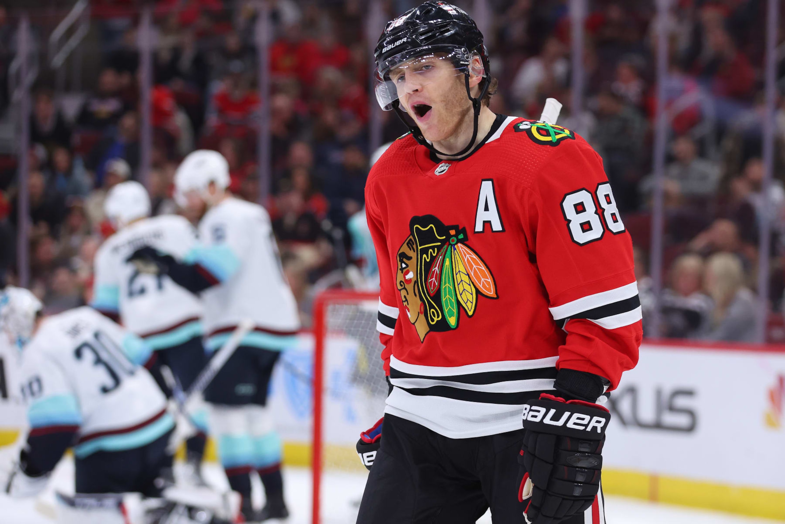 CHICAGO, ILLINOIS - JANUARY 14: Patrick Kane #88 of the Chicago Blackhawks reacts against the Seattle Kraken during the second period at United Center on January 14, 2023 in Chicago, Illinois. (Photo by Michael Reaves/Getty Images)