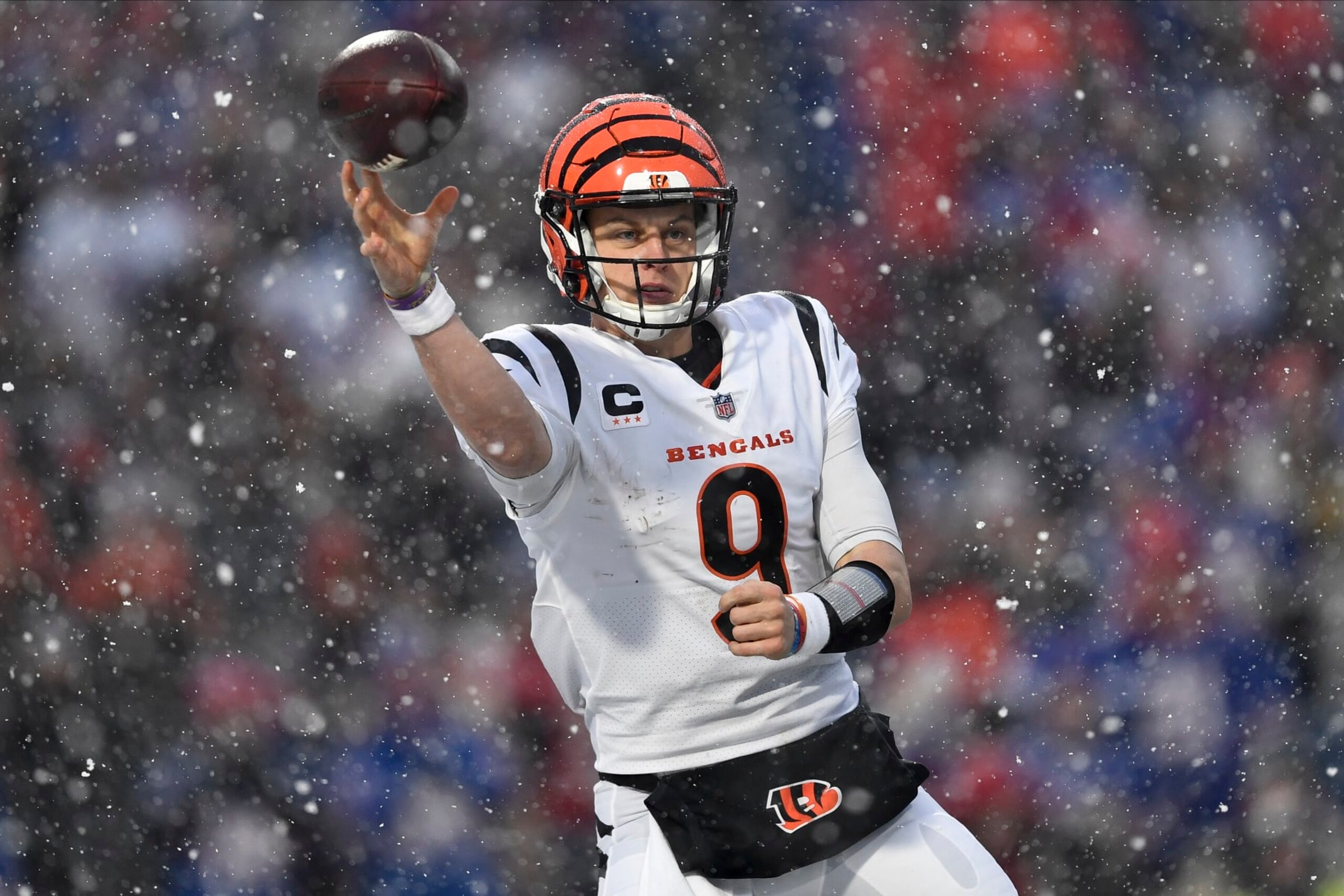 Cincinnati Bengals quarterback Joe Burrow (9) passes against the Buffalo Bills during the third quarter of an NFL division round football game, Sunday, Jan. 22, 2023, in Orchard Park, N.Y. (AP Photo/Adrian Kraus)