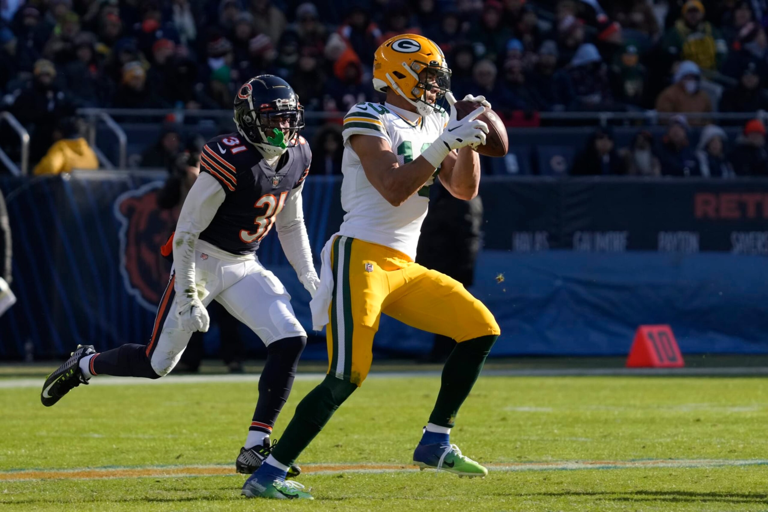 Green Bay Packers wide receiver Allen Lazard (13) catches the ball during the first half of an NFL football game against the Chicago Bears, Sunday, Dec. 4, 2022, in Chicago. (AP Photo/Nam Y. Huh) Green Bay Packers wide receiver Allen Lazard (13) catches the ball during the first half of an NFL football game against the Chicago Bears, Sunday, Dec. 4, 2022, in Chicago. (AP Photo/Nam Y. Huh)