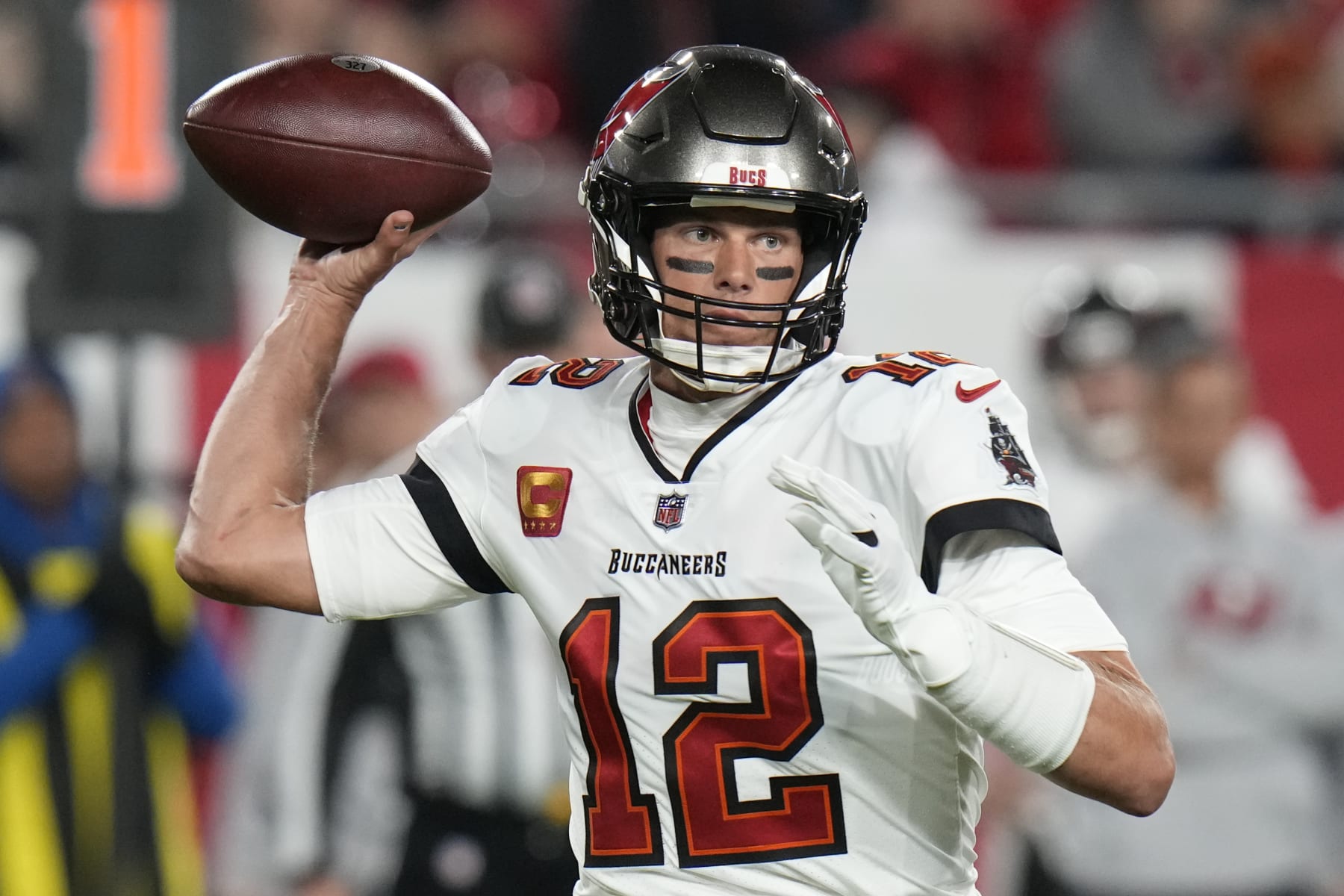 Tampa Bay Buccaneers quarterback Tom Brady (12) passes against the Dallas Cowboys during an NFL wild card playoff football game Monday, Jan 16, 2023, in Tampa, Fla. (AP Photo/Chris O'Meara)