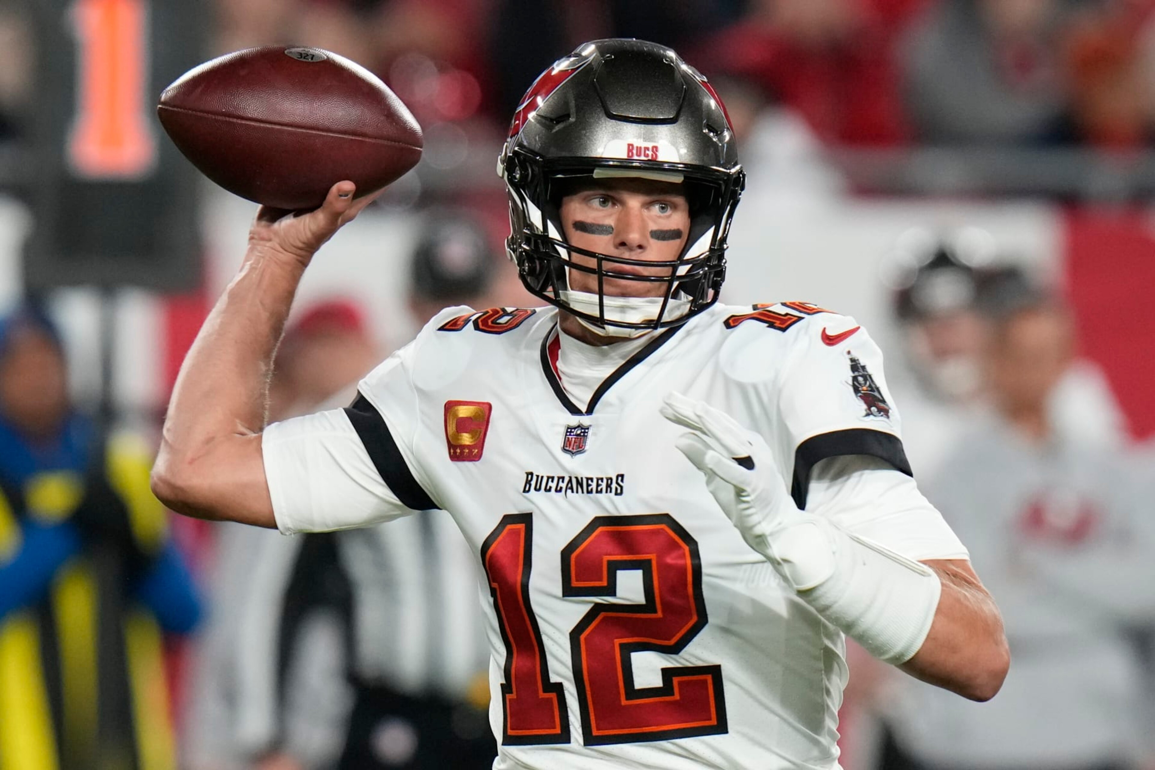 Tampa Bay Buccaneers quarterback Tom Brady (12) passes against the Dallas Cowboys during an NFL wild card playoff football game Monday, Jan 16, 2023, in Tampa, Fla. (AP Photo/Chris O'Meara) Tampa Bay Buccaneers quarterback Tom Brady (12) passes against the Dallas Cowboys during an NFL wild card playoff football game Monday, Jan 16, 2023, in Tampa, Fla. (AP Photo/Chris O'Meara)