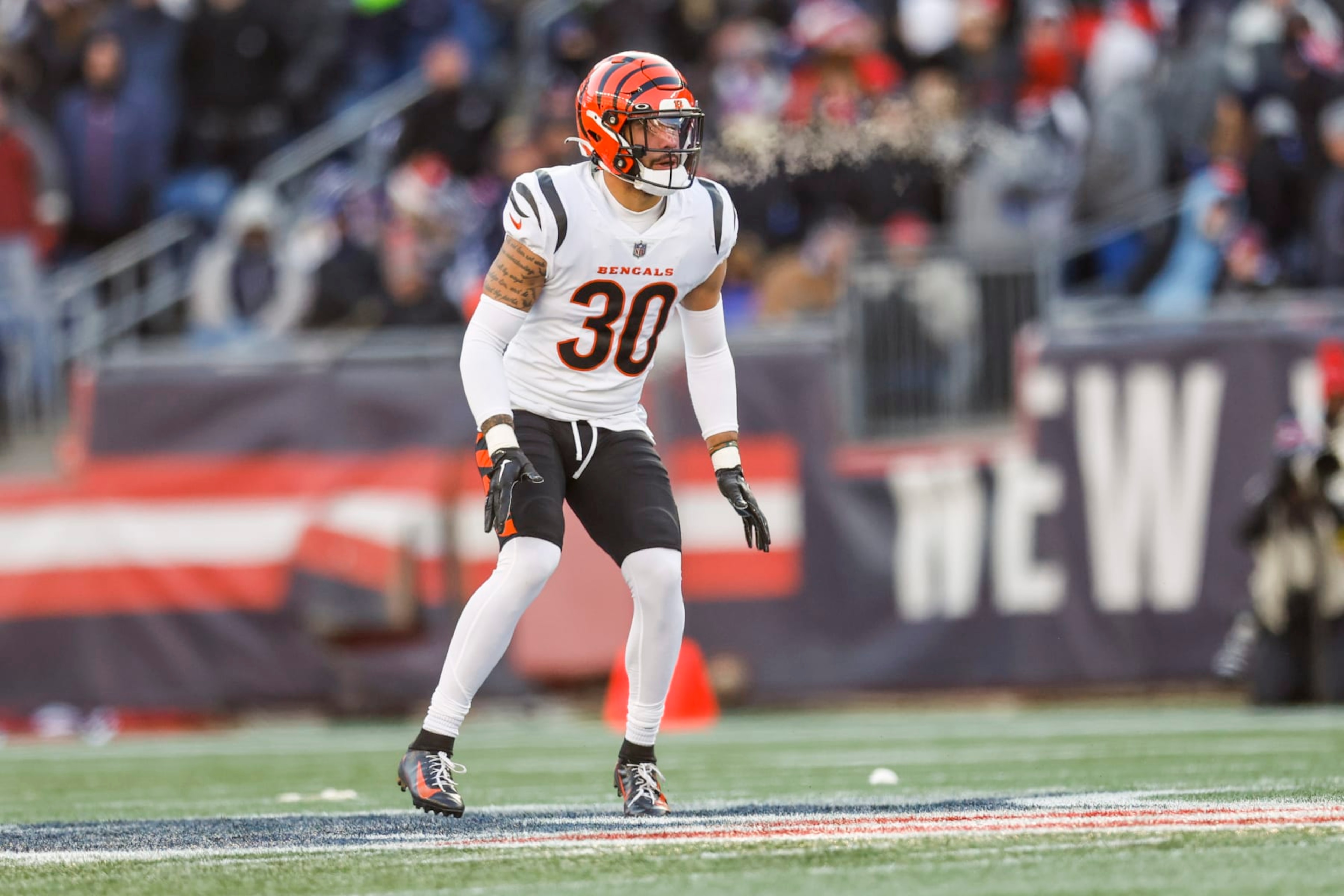 Cincinnati Bengals safety Jessie Bates III (30) exhales into the cold air during the first half of an NFL football game against the New England Patriots, Saturday, Dec. 24, 2022, in Foxborough, Mass. (AP Photo/Greg M. Cooper) Cincinnati Bengals safety Jessie Bates III (30) exhales into the cold air during the first half of an NFL football game against the New England Patriots, Saturday, Dec. 24, 2022, in Foxborough, Mass. (AP Photo/Greg M. Cooper)