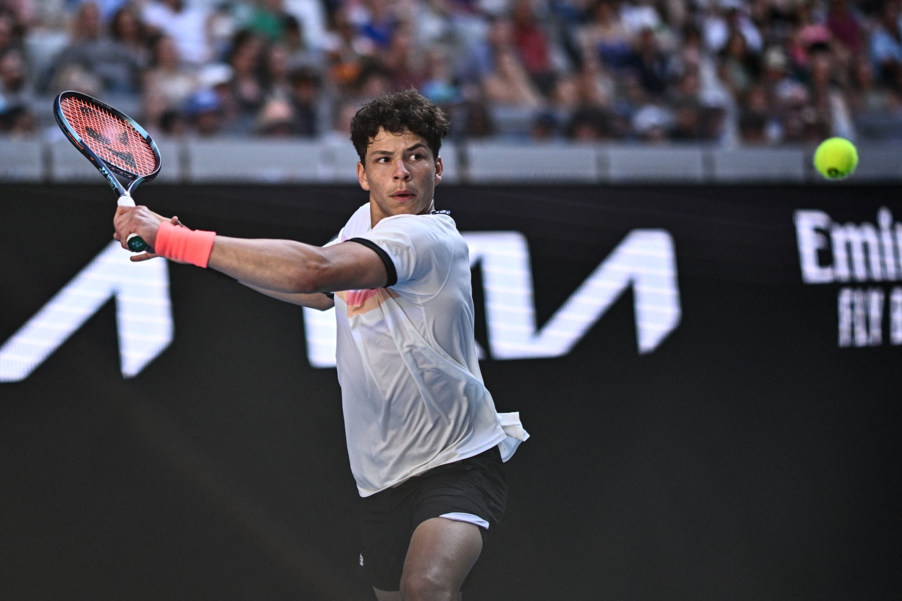 USA's Ben Shelton hits a return against USA's J.J. Wolf during their men's singles match on day eight of the Australian Open tennis tournament in Melbourne on January 23, 2023. - -- IMAGE RESTRICTED TO EDITORIAL USE - STRICTLY NO COMMERCIAL USE -- (Photo by ANTHONY WALLACE / AFP) / -- IMAGE RESTRICTED TO EDITORIAL USE - STRICTLY NO COMMERCIAL USE -- (Photo by ANTHONY WALLACE/AFP via Getty Images)