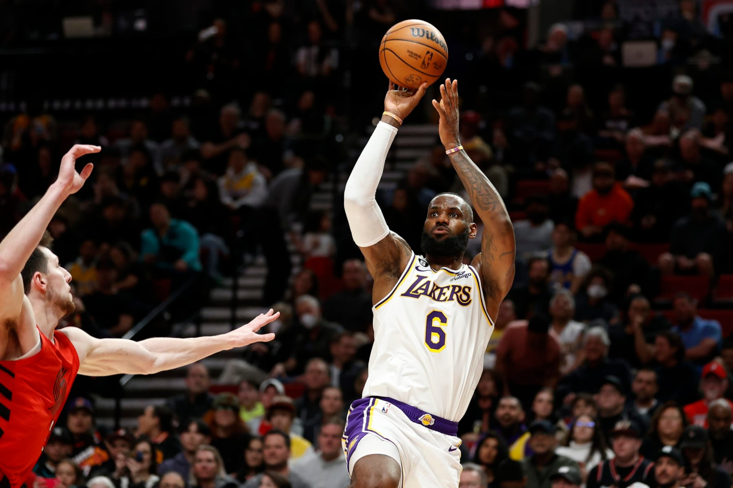 PORTLAND, OREGON - JANUARY 22: LeBron James #6 of the Los Angeles Lakers shoots against the Portland Trail Blazers during the first half at Moda Center on January 22, 2023 in Portland, Oregon. NOTE TO USER: User expressly acknowledges and agrees that, by downloading and/or using this photograph, User is consenting to the terms and conditions of the Getty Images License Agreement. (Photo by Steph Chambers/Getty Images)