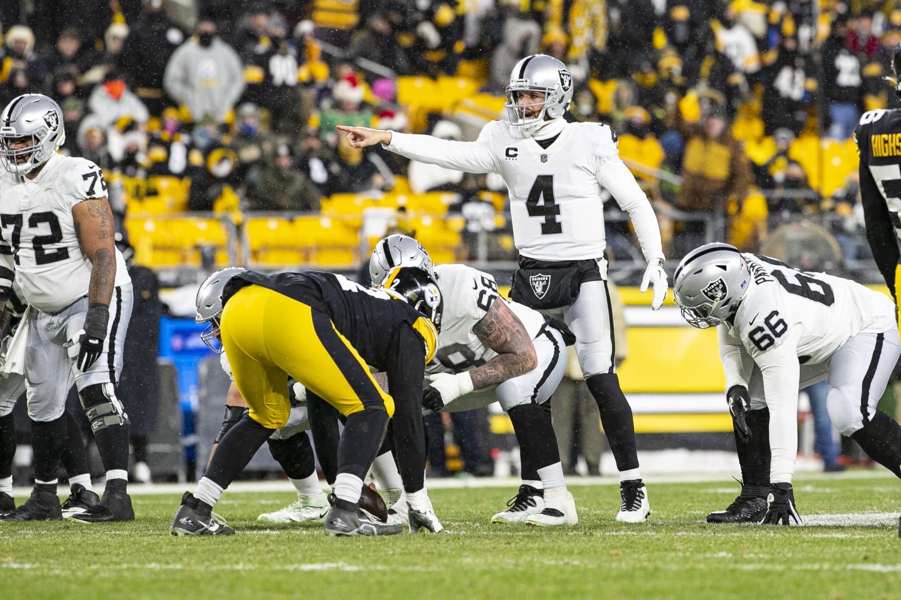 PITTSBURGH, PA - DECEMBER 24: Las Vegas Raiders quarterback Derek Carr (4) looks on during the national football league game between the Las Vegas Raiders and the Pittsburgh Steelers on December 24, 2022 at Acrisure Stadium in Pittsburgh, PA. (Photo by Mark Alberti/Icon Sportswire via Getty Images)