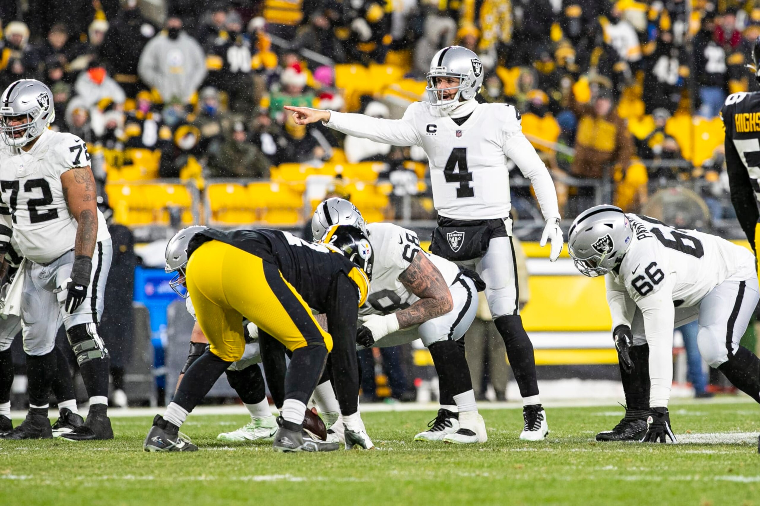 PITTSBURGH, PA - DECEMBER 24: Las Vegas Raiders quarterback Derek Carr (4) looks on during the national football league game between the Las Vegas Raiders and the Pittsburgh Steelers on December 24, 2022 at Acrisure Stadium in Pittsburgh, PA. (Photo by Mark Alberti/Icon Sportswire via Getty Images)