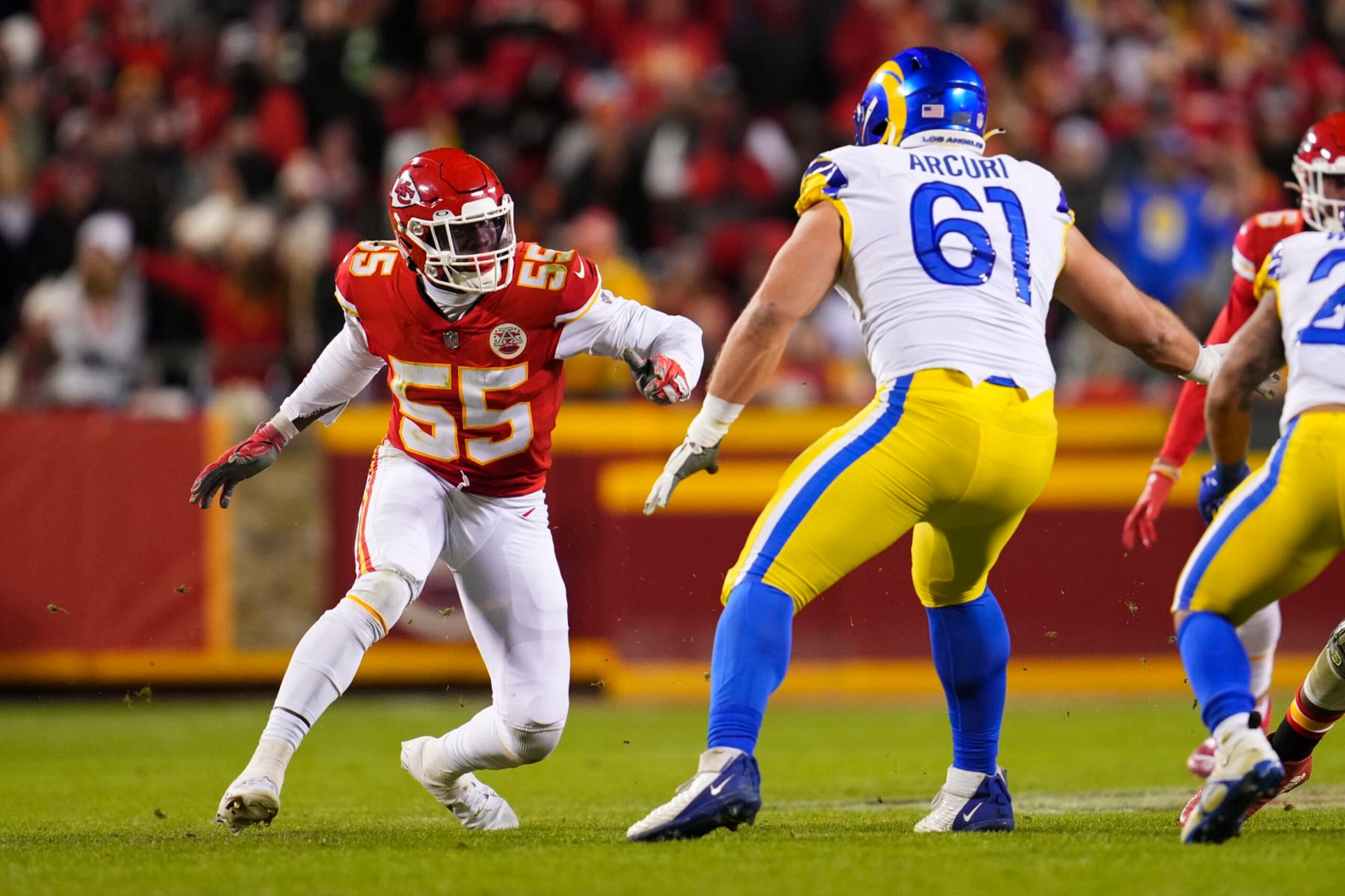 KANSAS CITY, MO - NOVEMBER 27: Frank Clark #55 of the Kansas City Chiefs battles with AJ Arcuri #61 of the Los Angeles Rams at GEHA Field at Arrowhead Stadium on November 27, 2022 in Kansas City, Missouri. (Photo by Cooper Neill/Getty Images)