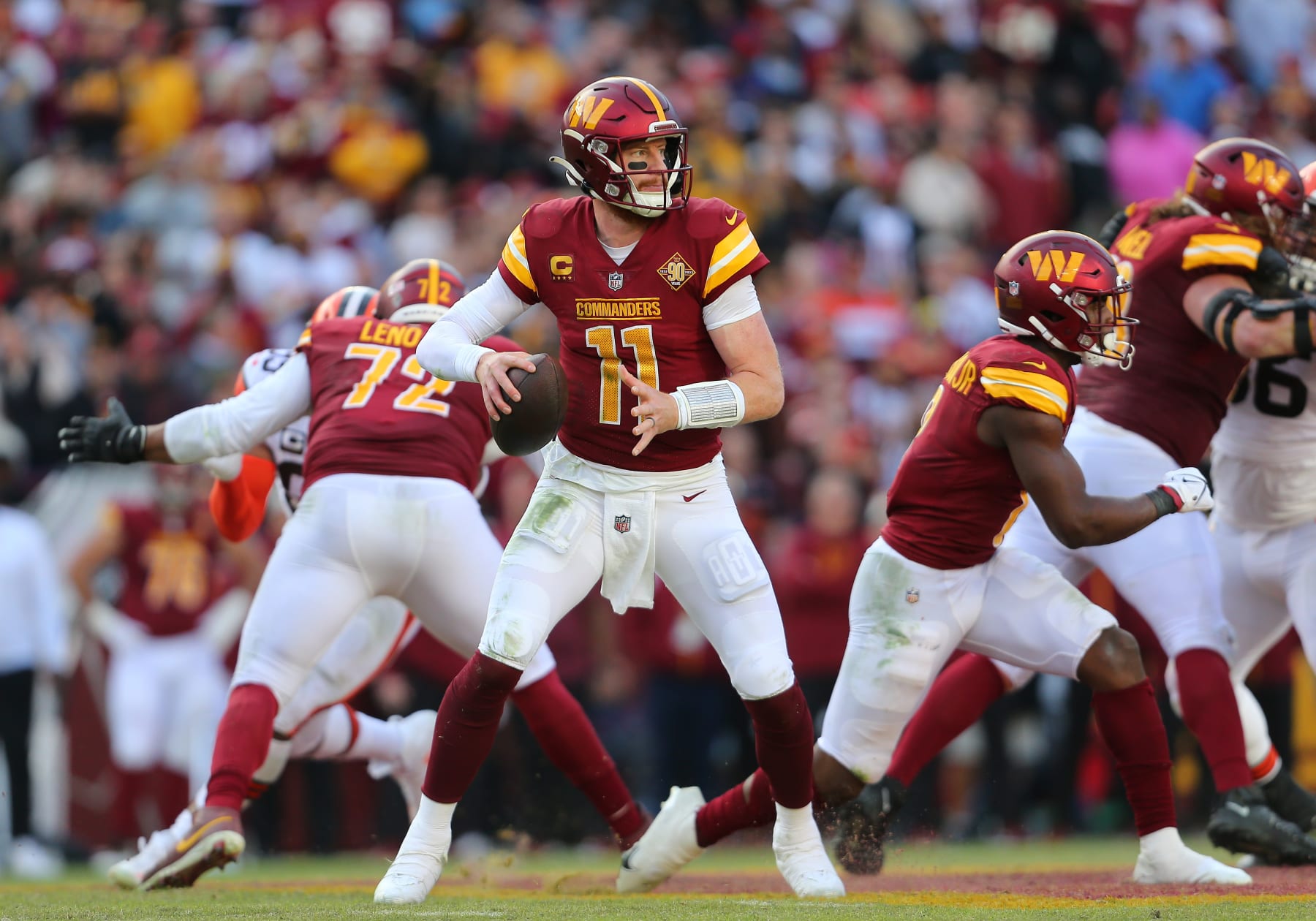 LANDOVER, MD - JANUARY 01: Washington Commanders quarterback Carson Wentz (11) throws a pass from the pocket during the Cleveland Browns game versus the Washington Commanders on January 01, 2023, at FedEx Field in Landover, MD. (Photo by Lee Coleman/Icon Sportswire via Getty Images)