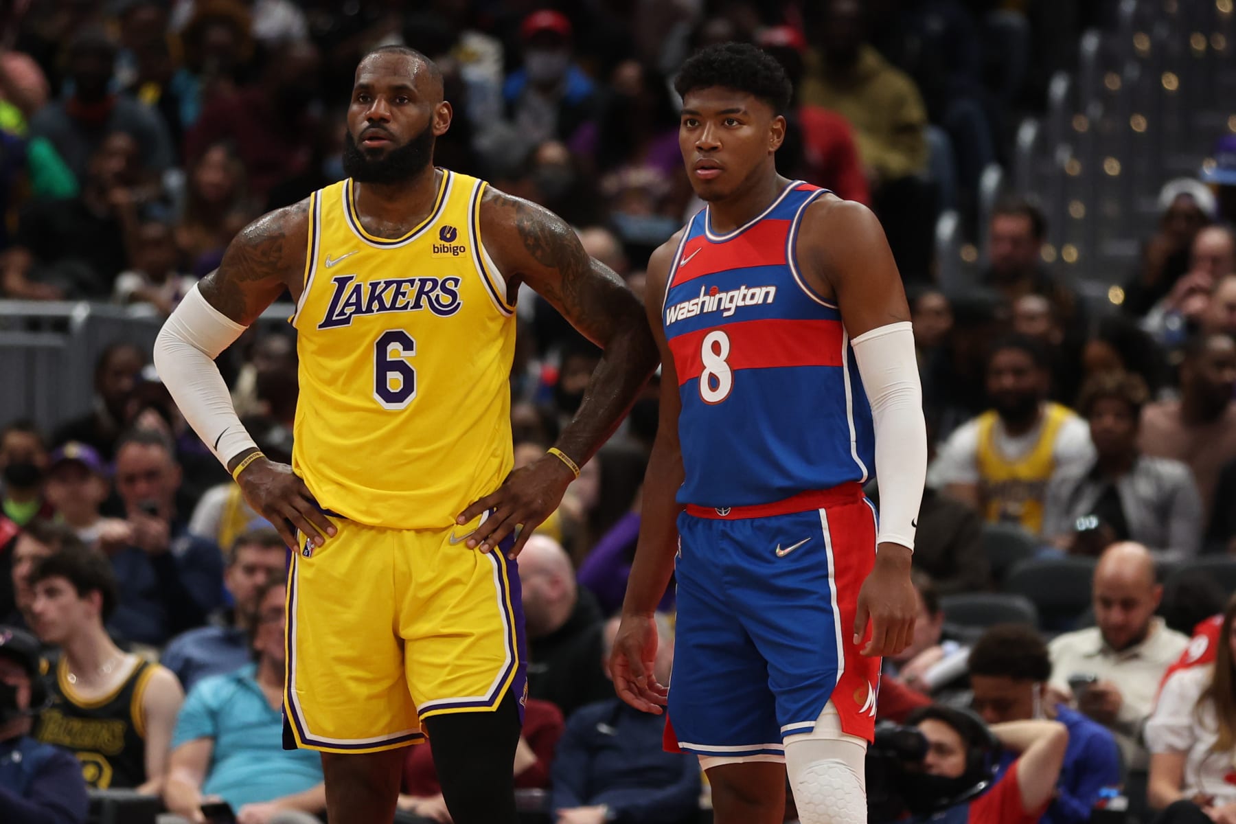 WASHINGTON, DC - MARCH 19: LeBron James #6 of the Los Angeles Lakers looks on next to Rui Hachimura #8 of the Washington Wizards during the first half at Capital One Arena on March 19, 2022 in Washington, DC. NOTE TO USER: User expressly acknowledges and agrees that, by downloading and or using this photograph, User is consenting to the terms and conditions of the Getty Images License Agreement. (Photo by Patrick Smith/Getty Images)