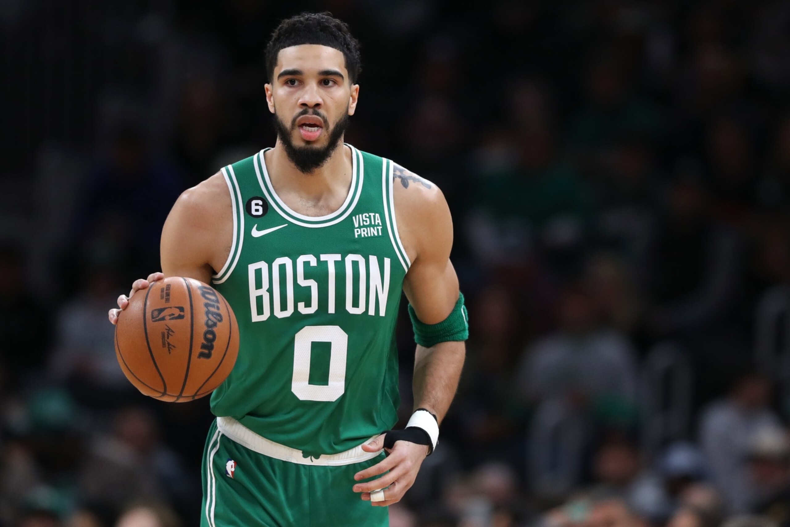 BOSTON, MASSACHUSETTS - JANUARY 19: Jayson Tatum #0 of the Boston Celtics dribbles downcourt during the first half against the Golden State Warriors at TD Garden on January 19, 2023 in Boston, Massachusetts. NOTE TO USER: User expressly acknowledges and agrees that, by downloading and or using this photograph, User is consenting to the terms and conditions of the Getty Images License Agreement. (Photo by Maddie Meyer/Getty Images)
