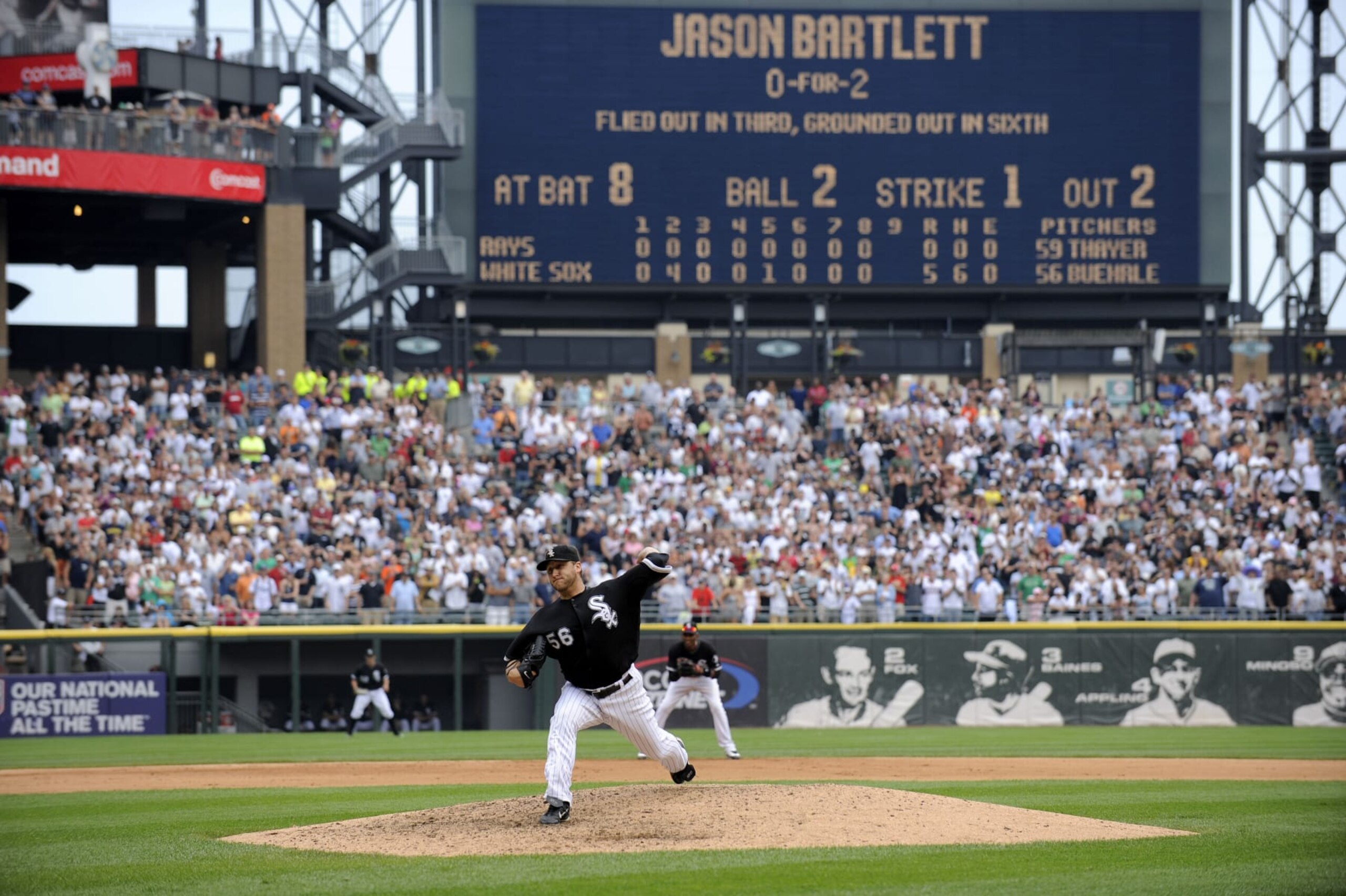 CHICAGO - JULY 23:  Mark Buehrle #56 of the Chicago White Sox throws the final pitch of the game to Jason Bartlett to record the 18th perfect game in major league history against the Tampa Bay Rays on June 23, 2009 at U.S. Cellular Field in Chicago, Illinois.  The White Sox defeated the 5-0.  (Photo by Ron Vesely/MLB Photos via Getty Images)