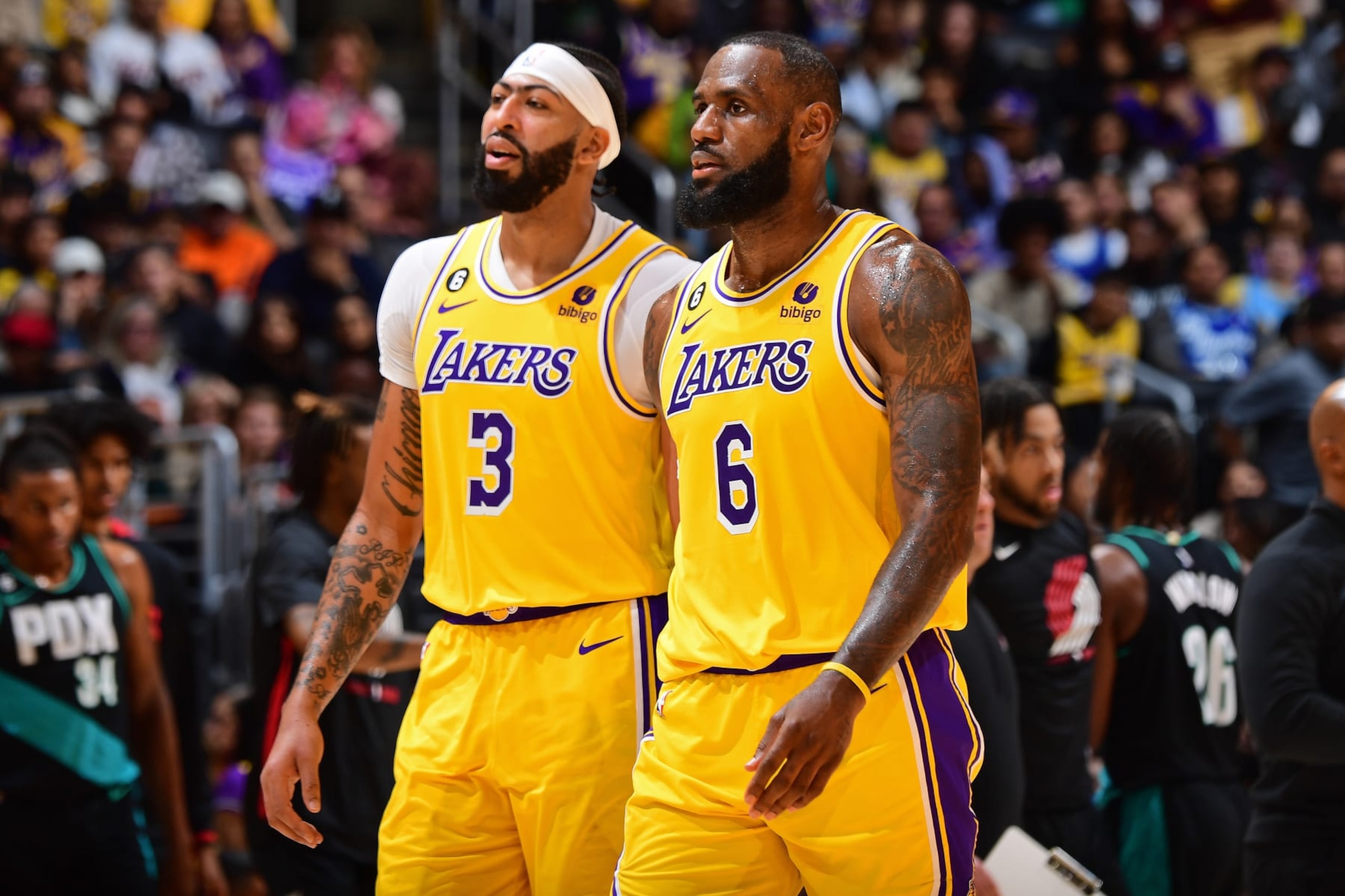 LOS ANGELES, CA - NOVEMBER 30: LeBron James #6 and Anthony Davis #3 of the Los Angeles Lakers look on during the game against the Portland Trail Blazers on November 30, 2022 at Crypto.Com Arena in Los Angeles, California. NOTE TO USER: User expressly acknowledges and agrees that, by downloading and/or using this Photograph, user is consenting to the terms and conditions of the Getty Images License Agreement. Mandatory Copyright Notice: Copyright 2022 NBAE (Photo by Adam Pantozzi/NBAE via Getty Images) LOS ANGELES, CA - NOVEMBER 30: LeBron James #6 and Anthony Davis #3 of the Los Angeles Lakers look on during the game against the Portland Trail Blazers on November 30, 2022 at Crypto.Com Arena in Los Angeles, California. NOTE TO USER: User expressly acknowledges and agrees that, by downloading and/or using this Photograph, user is consenting to the terms and conditions of the Getty Images License Agreement. Mandatory Copyright Notice: Copyright 2022 NBAE (Photo by Adam Pantozzi/NBAE via Getty Images)