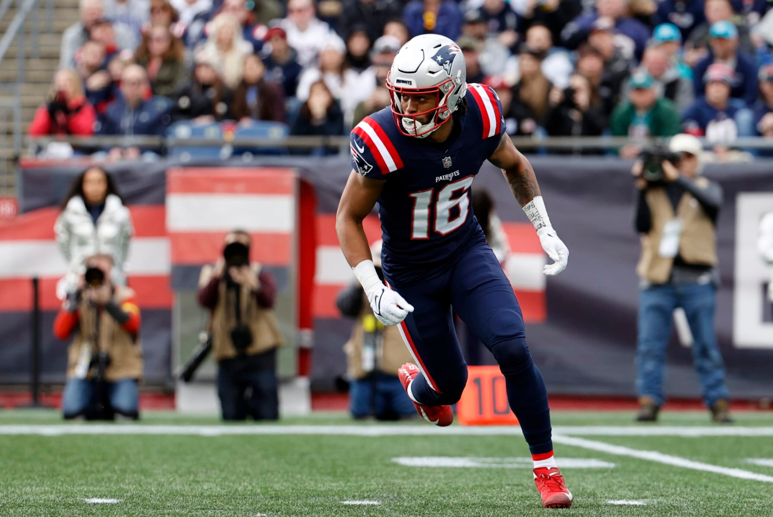 FOXBOROUGH, MA - JANUARY 01: New England Patriots wide receiver Jakobi Meyers (16) goes in motion on a trick play during a game between the New England Patriots and the Miami Dolphins on January 1, 2023, at Gillette Stadium in Foxboro, Massachusetts. (Photo by Fred Kfoury III/Icon Sportswire via Getty Images)