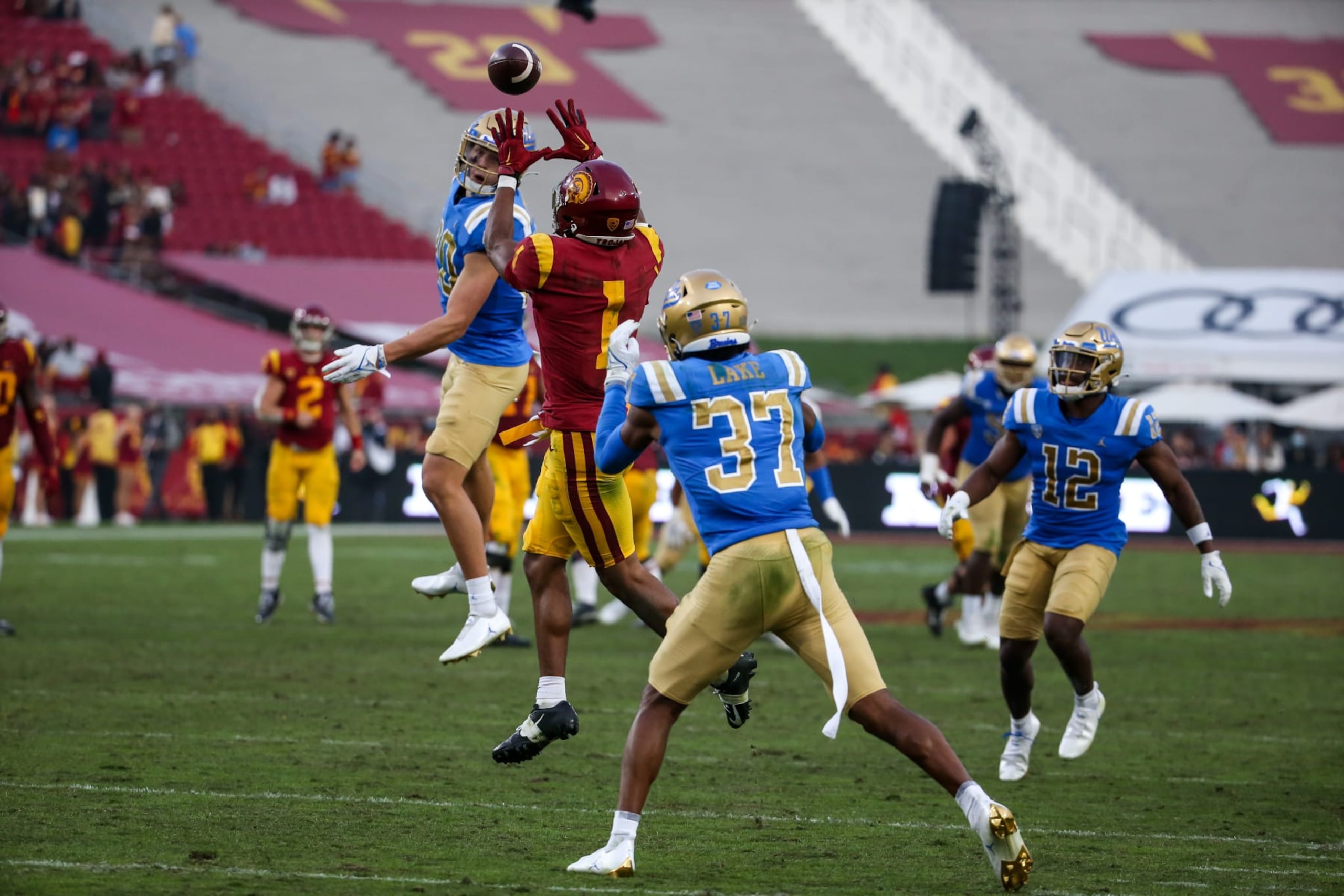 LOS ANGELES, CA - NOVEMBER 20:USC Trojans wide receiver Gary Bryant Jr. #1 goes up for catch guarded by UCLA Bruins defensive back Quentin Lake (37)  during UCLA Bruins vs USC Trojans game on November 20, 2021, at the Los Angeles Memorial Coliseum in Los Angeles, CA. (Photo by Jevone Moore/Icon Sportswire via Getty Images)
