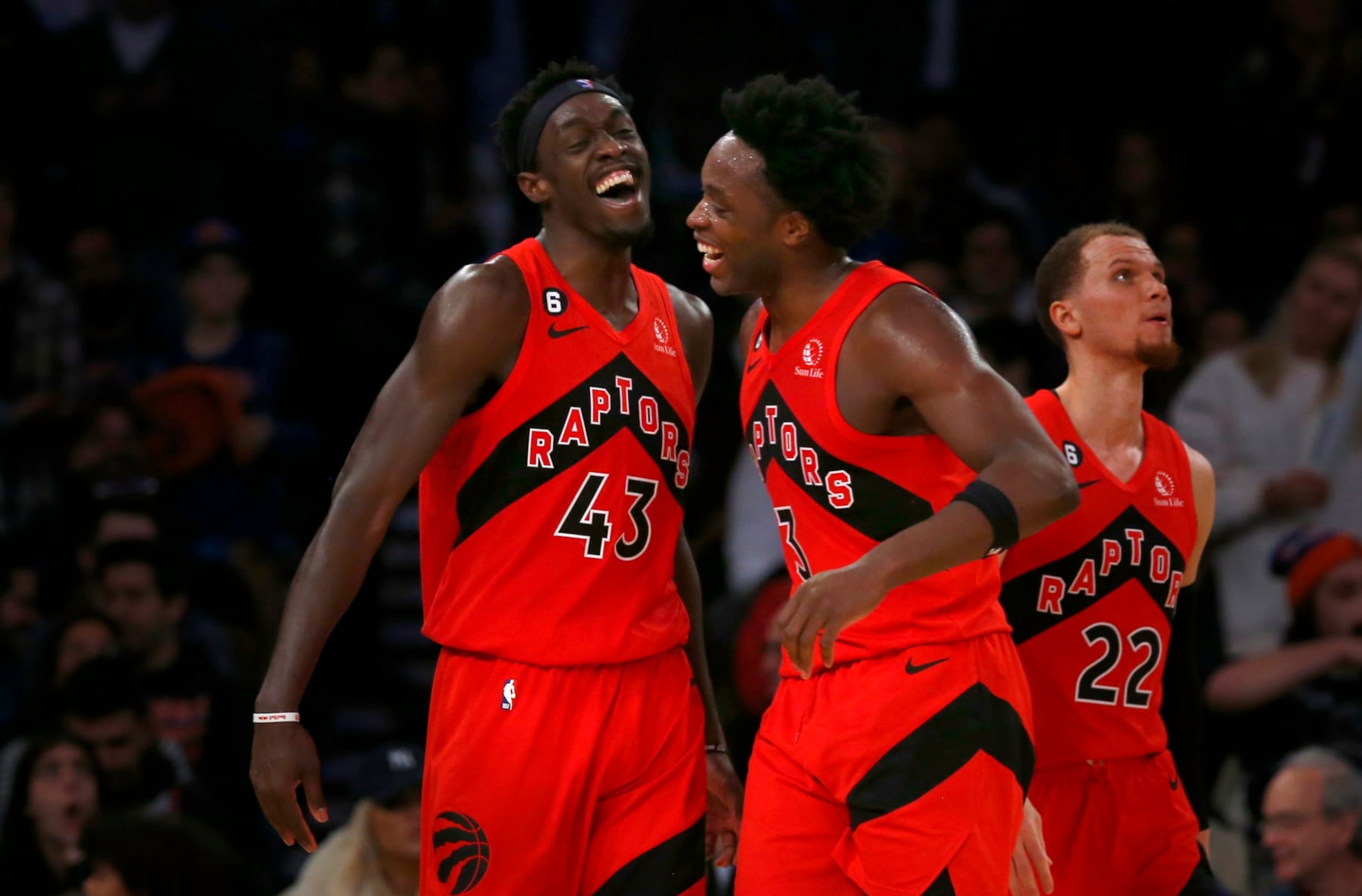Toronto Raptors forwards Pascal Siakam (43) and O.G. Anunoby react after Siakam surpasses 50 points for the game during the second half of an NBA basketball game against the New York Knicks Wednesday, Dec. 21, 2022, in New York. Siakam finished with 52 points and the Raptors won 113-106. (AP Photo/John Munson)