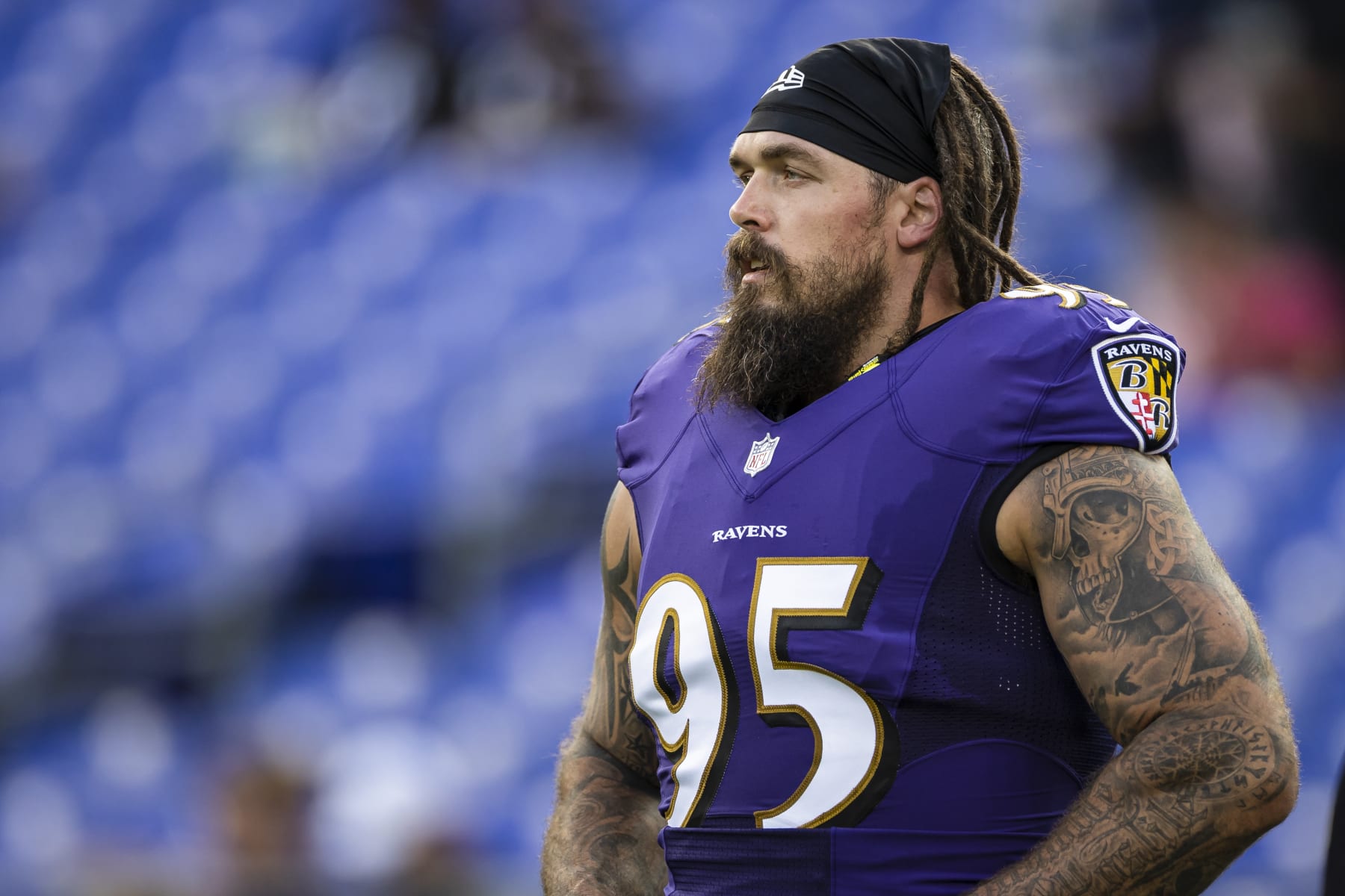 BALTIMORE, MD - AUGUST 14: Derek Wolfe #95 of the Baltimore Ravens looks on before a preseason game against the New Orleans Saints at M&T Bank Stadium on August 14, 2021 in Baltimore, Maryland. (Photo by Scott Taetsch/Getty Images)