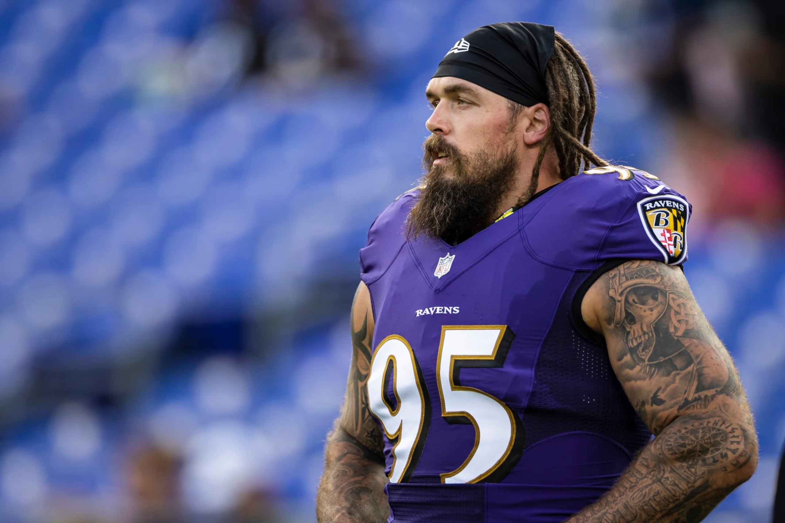BALTIMORE, MD - AUGUST 14: Derek Wolfe #95 of the Baltimore Ravens looks on before a preseason game against the New Orleans Saints at M&T Bank Stadium on August 14, 2021 in Baltimore, Maryland. (Photo by Scott Taetsch/Getty Images)