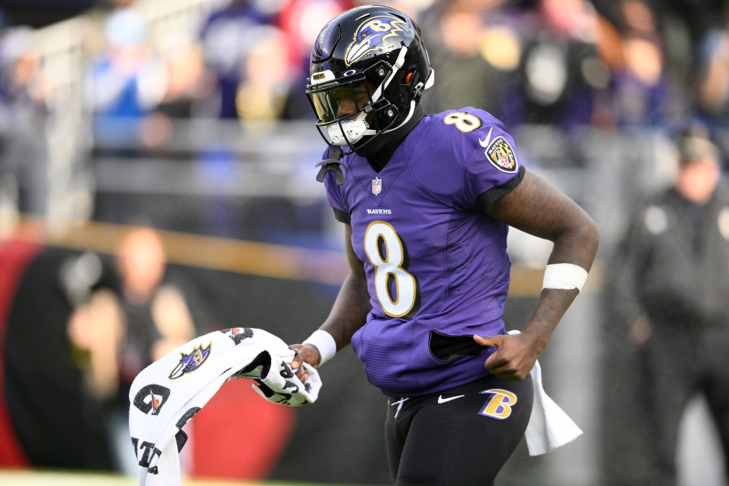 Baltimore Ravens quarterback Lamar Jackson (8) takes to the field before an NFL football game against the Denver Broncos, Sunday, Dec. 4, 2022, in Baltimore. (AP Photo/Nick Wass)