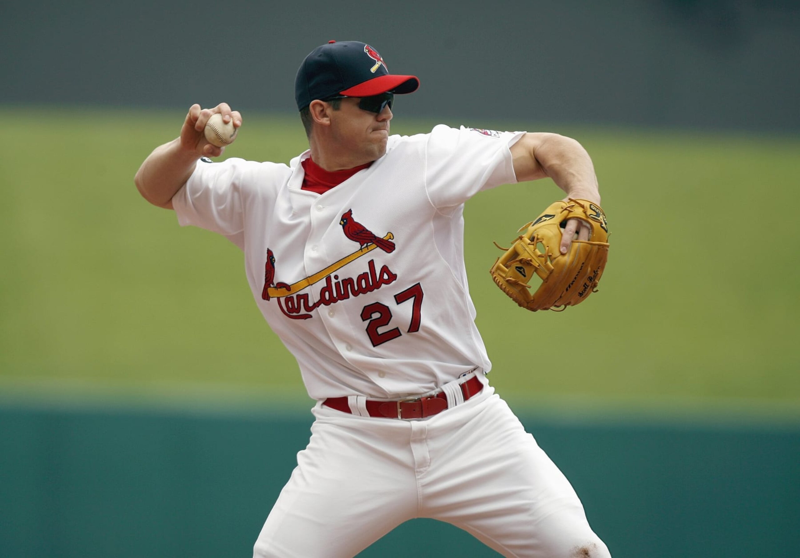 ST. LOUIS, MO - MAY 27: Scott Rolen #27 of the St. Louis Cardinals throws the ball against the Washington Nationals on May 27, 2007 at Busch Stadium in St. Louis, Missouri. The Nationals beat the Cards 7-2.   (Photo by Dilip Vishwanat/Getty Images)