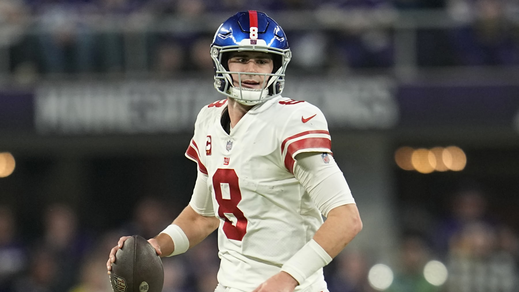 New York Giants quarterback Daniel Jones (8) runs down the field during the first half of an NFL wild-card football game against the Minnesota Vikings, Sunday, Jan. 15, 2023, in Minneapolis. (AP Photo/Abbie Parr)