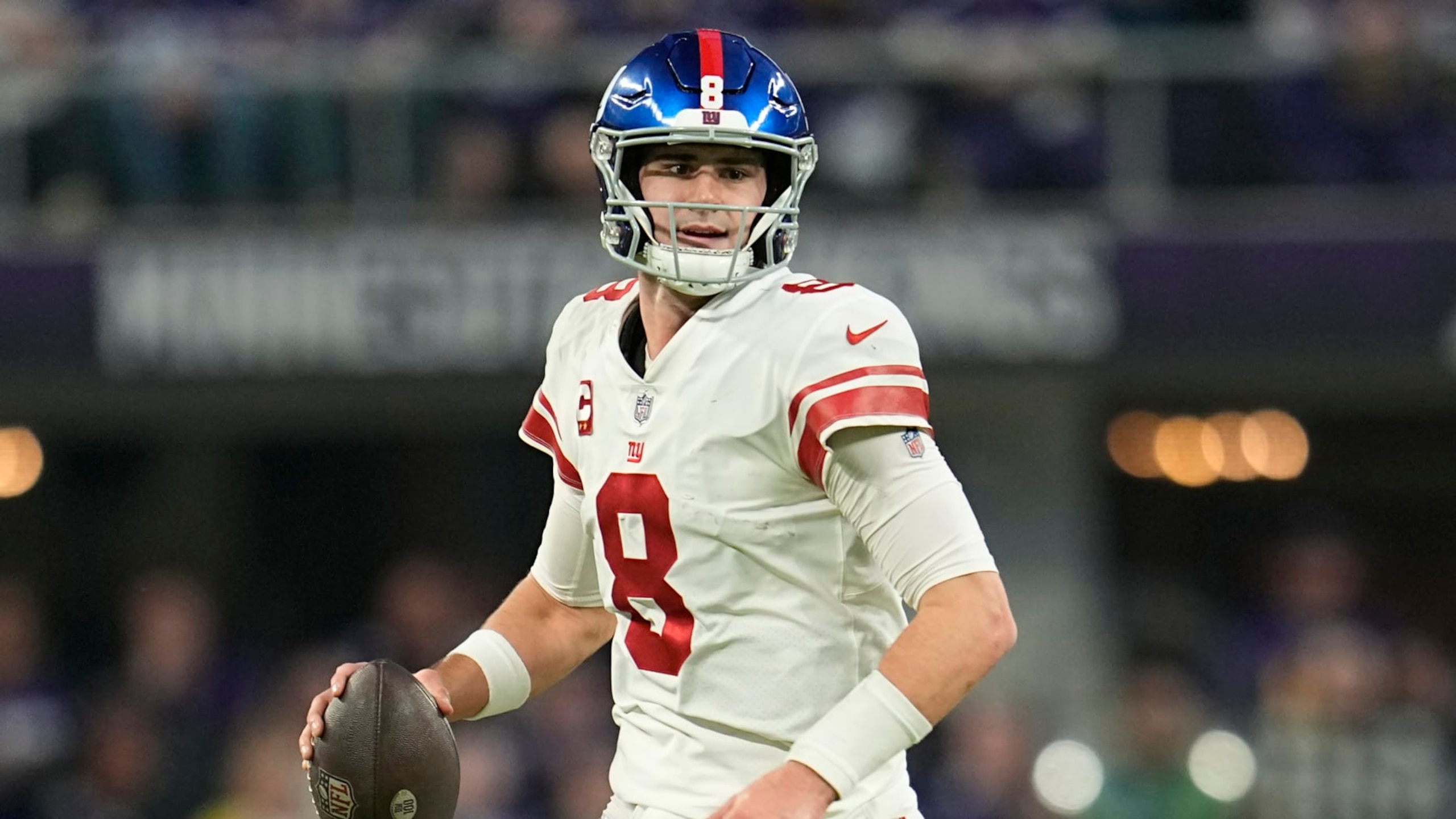 New York Giants quarterback Daniel Jones (8) runs down the field during the first half of an NFL wild-card football game against the Minnesota Vikings, Sunday, Jan. 15, 2023, in Minneapolis. (AP Photo/Abbie Parr) New York Giants quarterback Daniel Jones (8) runs down the field during the first half of an NFL wild-card football game against the Minnesota Vikings, Sunday, Jan. 15, 2023, in Minneapolis. (AP Photo/Abbie Parr)