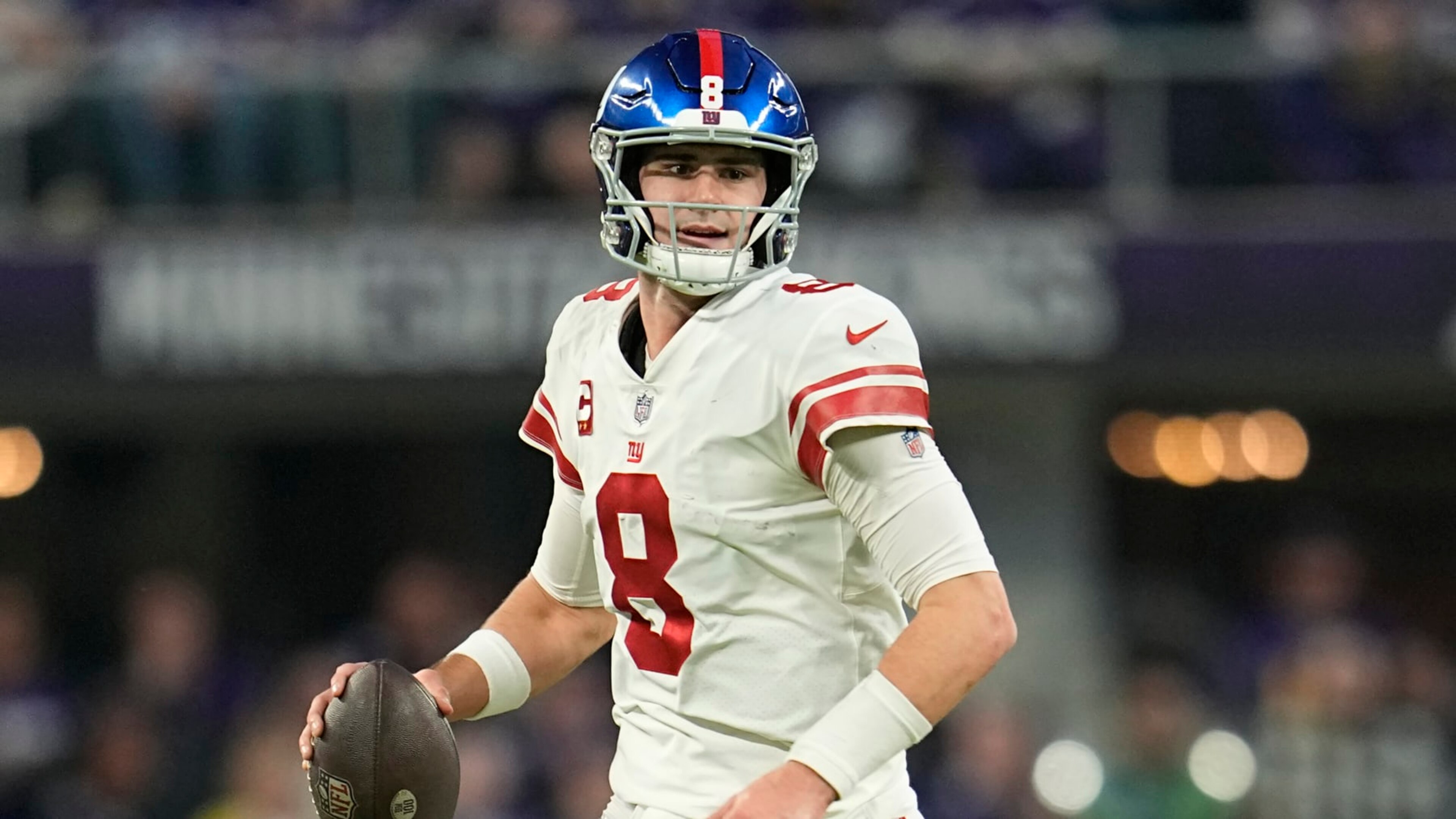 New York Giants quarterback Daniel Jones (8) runs down the field during the first half of an NFL wild-card football game against the Minnesota Vikings, Sunday, Jan. 15, 2023, in Minneapolis. (AP Photo/Abbie Parr) New York Giants quarterback Daniel Jones (8) runs down the field during the first half of an NFL wild-card football game against the Minnesota Vikings, Sunday, Jan. 15, 2023, in Minneapolis. (AP Photo/Abbie Parr)