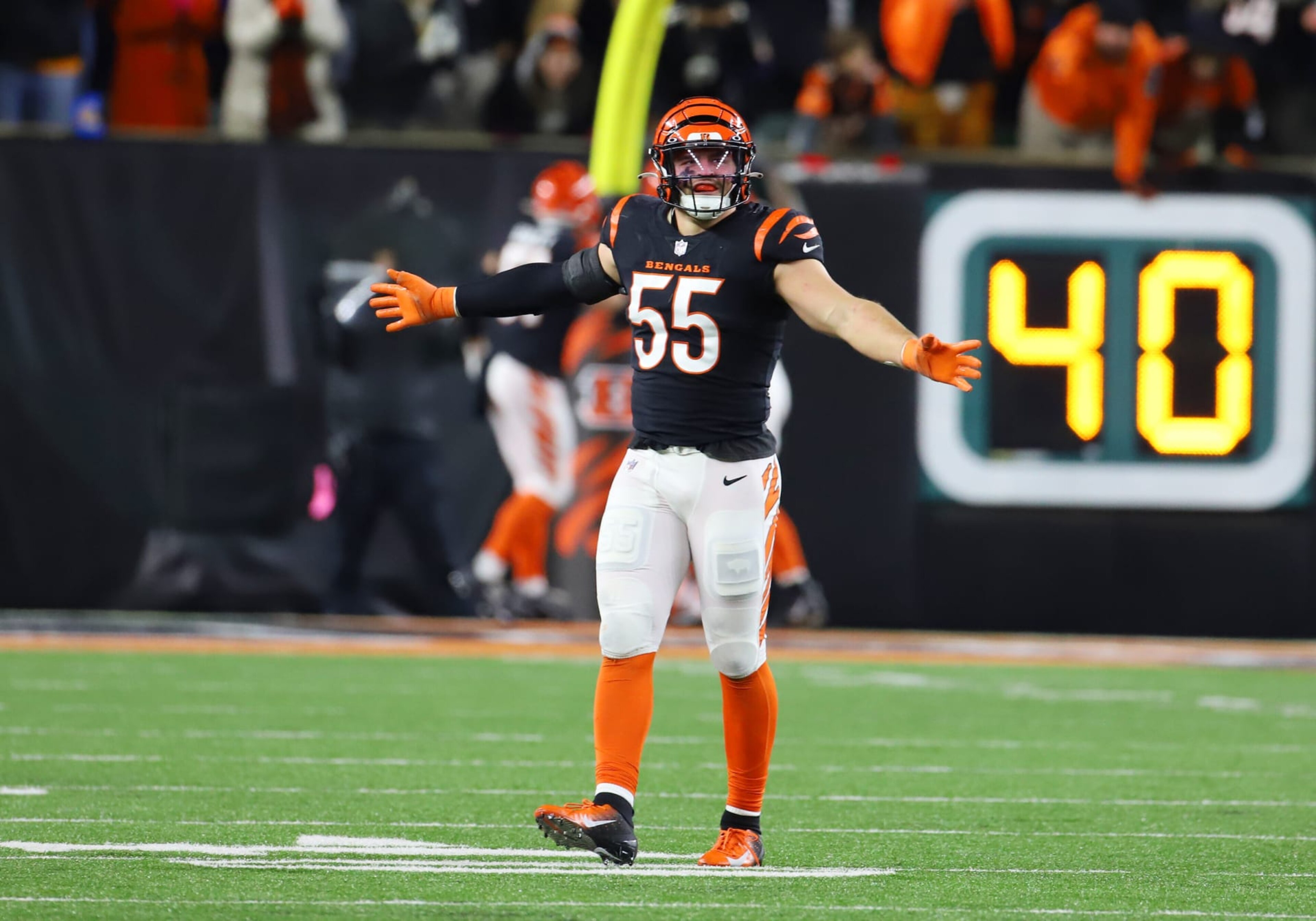 CINCINNATI, OH - JANUARY 15: Cincinnati Bengals linebacker Logan Wilson (55) celebrates in an AFC Wild Card Playoff game between the Baltimore Ravens and the Cincinnati Bengals on January 15, 2023, at Paycor Stadium in Cincinnati, OH. (Photo by Jeff Moreland/Icon Sportswire via Getty Images) CINCINNATI, OH - JANUARY 15: Cincinnati Bengals linebacker Logan Wilson (55) celebrates in an AFC Wild Card Playoff game between the Baltimore Ravens and the Cincinnati Bengals on January 15, 2023, at Paycor Stadium in Cincinnati, OH. (Photo by Jeff Moreland/Icon Sportswire via Getty Images)