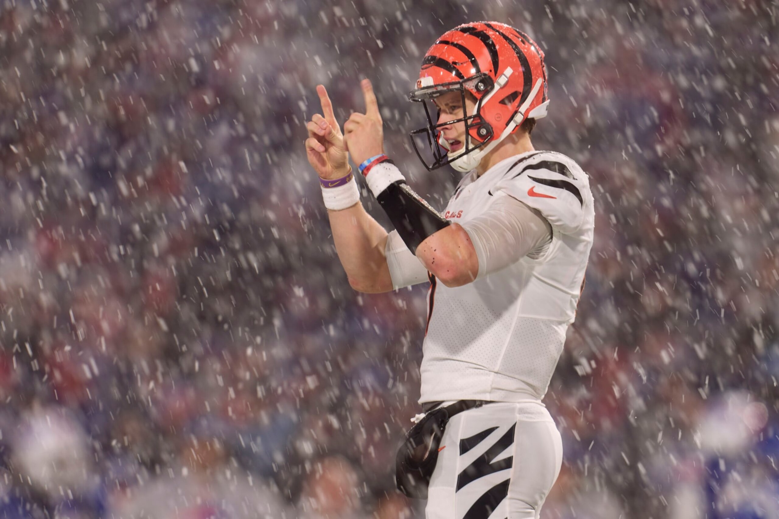 ORCHARD PARK, NY - JANUARY 22: Joe Burrow #9 of the Cincinnati Bengals looks towards the sideline against the Buffalo Bills during the second half at Highmark Stadium on January 22, 2023 in Orchard Park, New York. (Photo by Cooper Neill/Getty Images)