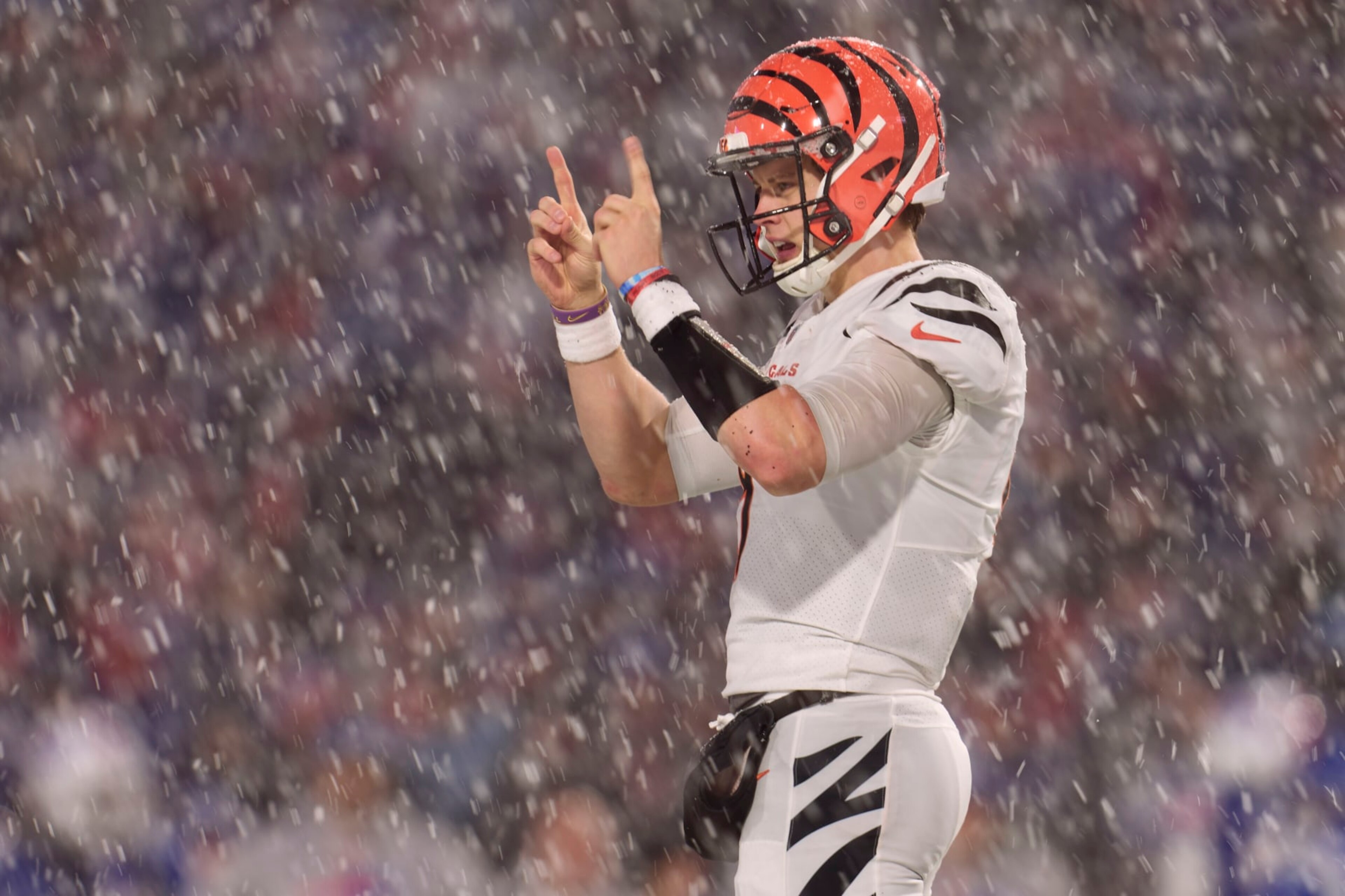 ORCHARD PARK, NY - JANUARY 22: Joe Burrow #9 of the Cincinnati Bengals looks towards the sideline against the Buffalo Bills during the second half at Highmark Stadium on January 22, 2023 in Orchard Park, New York. (Photo by Cooper Neill/Getty Images)
