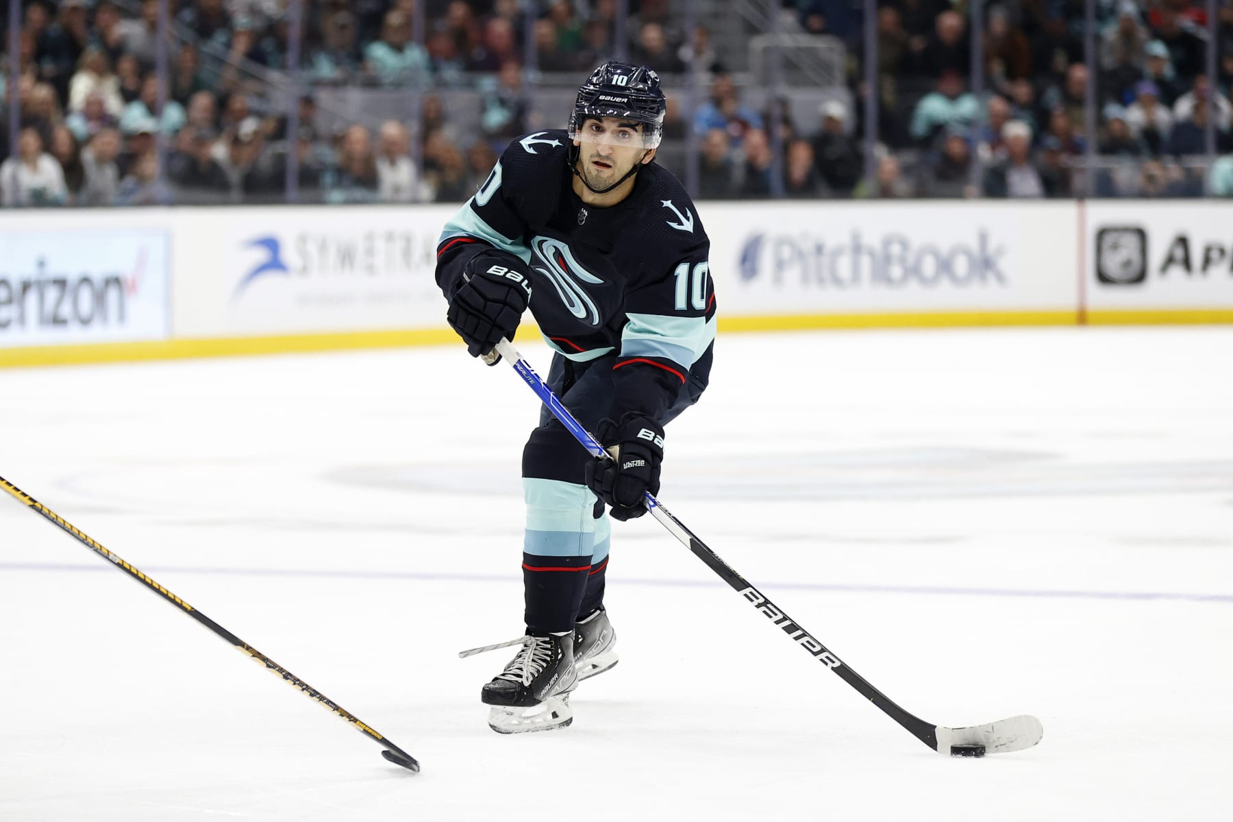 SEATTLE, WASHINGTON - JANUARY 21: Matty Beniers #10 of the Seattle Kraken skates in overtime against the Colorado Avalanche at Climate Pledge Arena on January 21, 2023 in Seattle, Washington. (Photo by Steph Chambers/Getty Images)