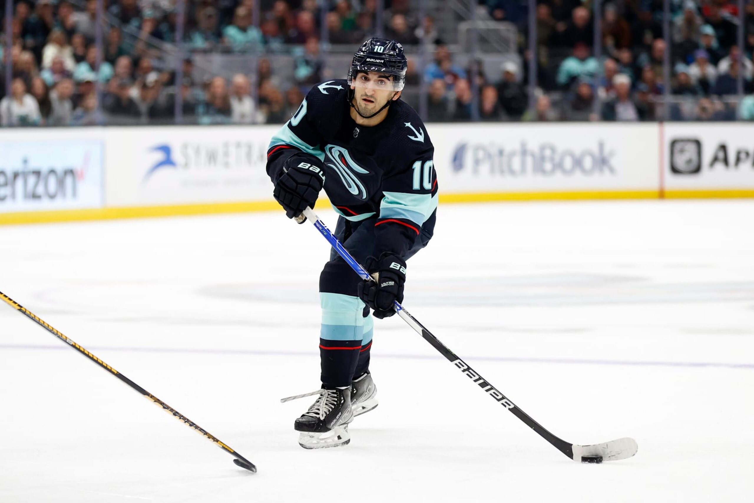SEATTLE, WASHINGTON - JANUARY 21: Matty Beniers #10 of the Seattle Kraken skates in overtime against the Colorado Avalanche at Climate Pledge Arena on January 21, 2023 in Seattle, Washington. (Photo by Steph Chambers/Getty Images)