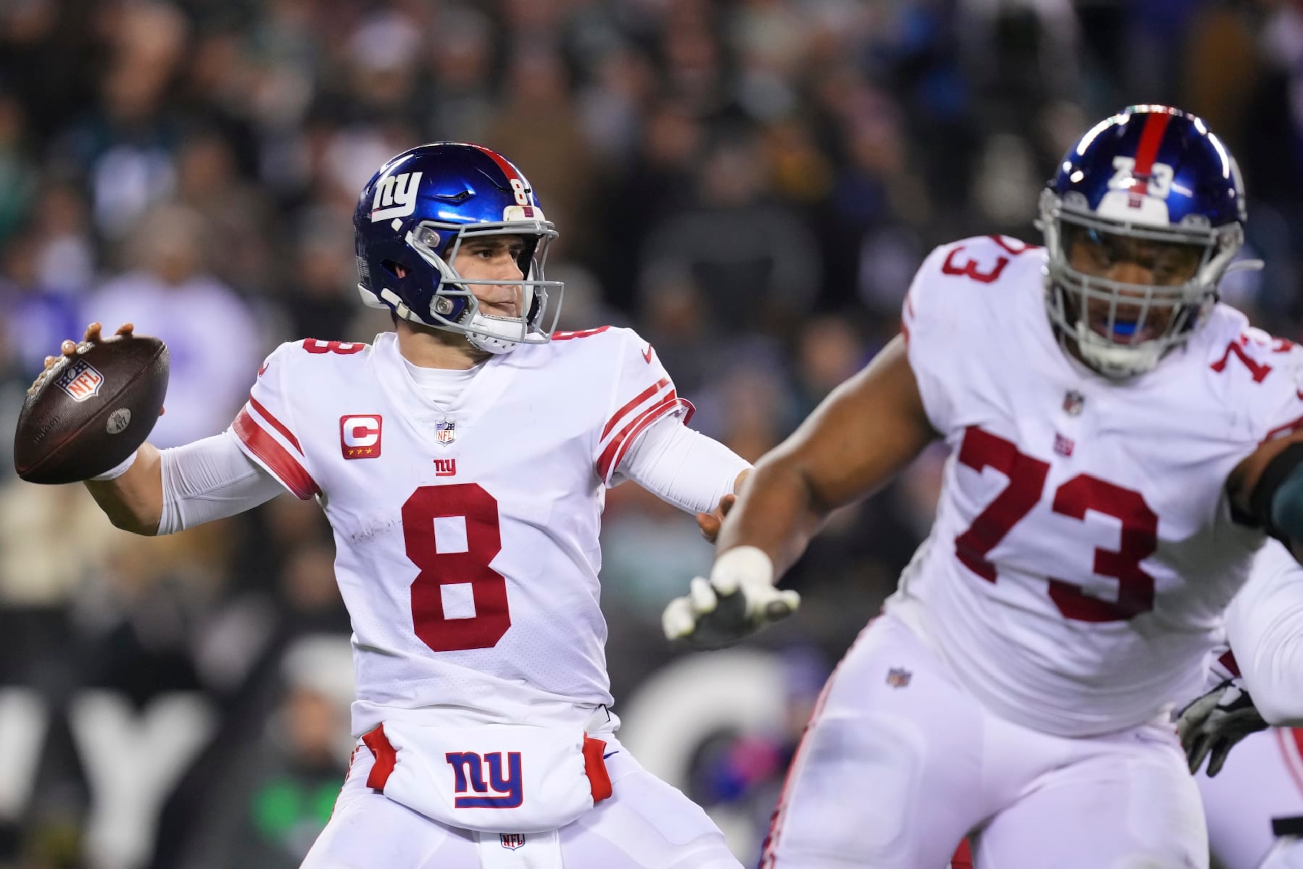 PHILADELPHIA, PA - JANUARY 21: Daniel Jones #8 of the New York Giants passes the ball as Evan Neal #73 blocks against the Philadelphia Eagles during the NFC Divisional Playoff game at Lincoln Financial Field on January 21, 2023 in Philadelphia, Pennsylvania. (Photo by Mitchell Leff/Getty Images)
