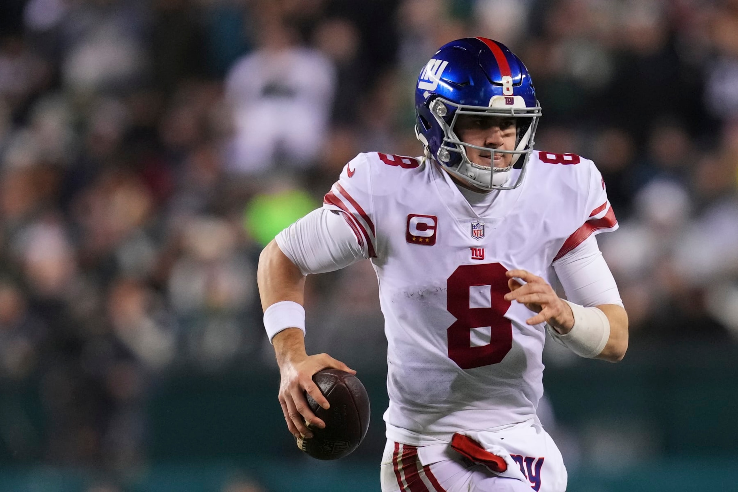 PHILADELPHIA, PA - JANUARY 21: Daniel Jones #8 of the New York Giants runs with the ball against the Philadelphia Eagles during the NFC Divisional Playoff game at Lincoln Financial Field on January 21, 2023 in Philadelphia, Pennsylvania. (Photo by Mitchell Leff/Getty Images)