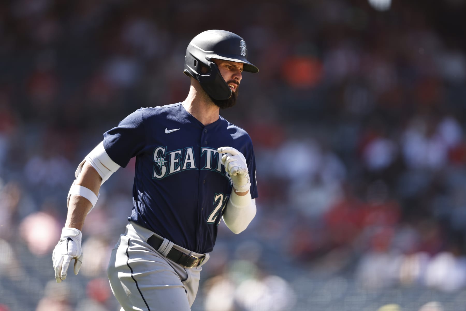 ANAHEIM, CALIFORNIA - AUGUST 17: Jesse Winker #27 of the Seattle Mariners runs to first base during the sixth inning of a game between the Los Angeles Angels and the Seattle Mariners at Angel Stadium of Anaheim on August 17, 2022 in Anaheim, California. (Photo by Michael Owens/Getty Images)